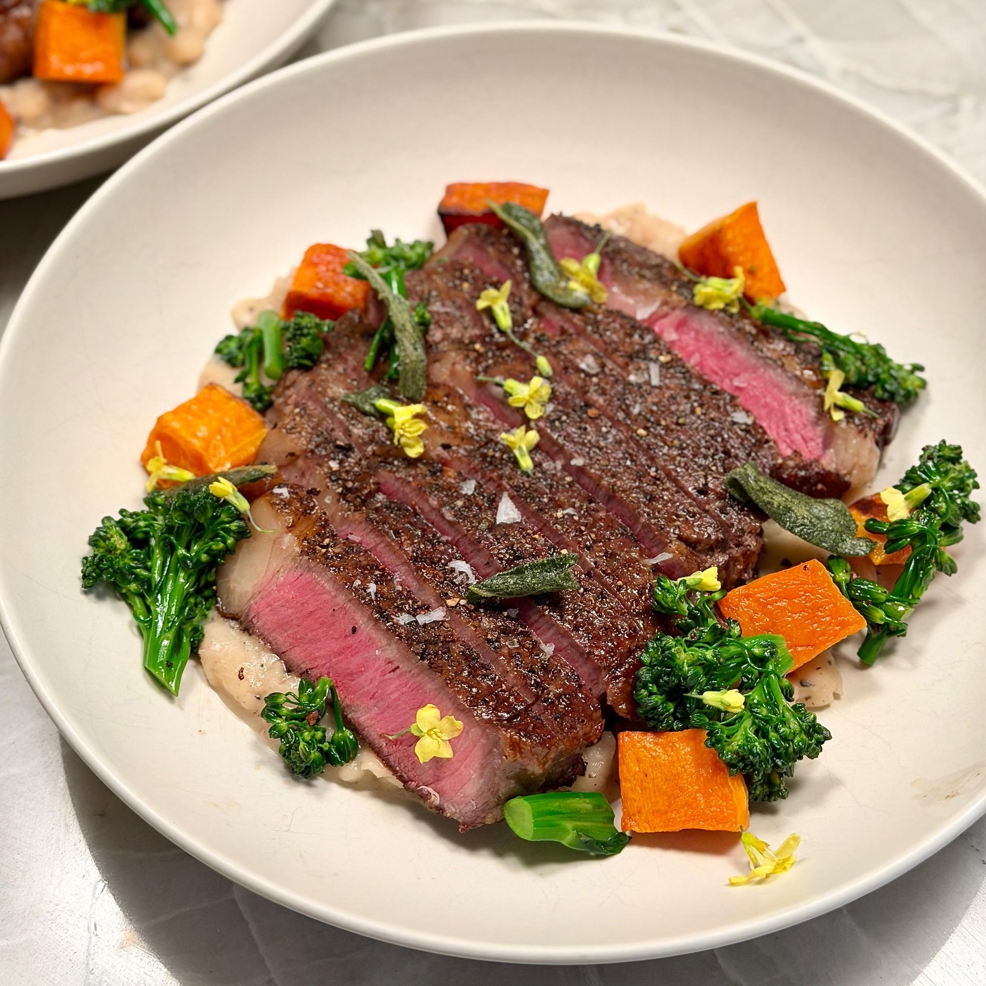 Private chef plates (Entry 01): Pepper crusted @altairwagyu grass-fed ribeye • Cacio e pepe inspired beans • Roasted butternut squash • Charred broccolini • Crispy sage
I cook for a family full time, so I get to make a lot of food across a lot of cuisines, with great ingredients and a client who genuinely loves flavor and creativity.
In the old IG spirit, I’m posting plates again. A few each week. Western classics, Asian classics and remixes, plus new cuisines that keep me learning.
#privatechef #cheflife #finediningathome #comfortfood