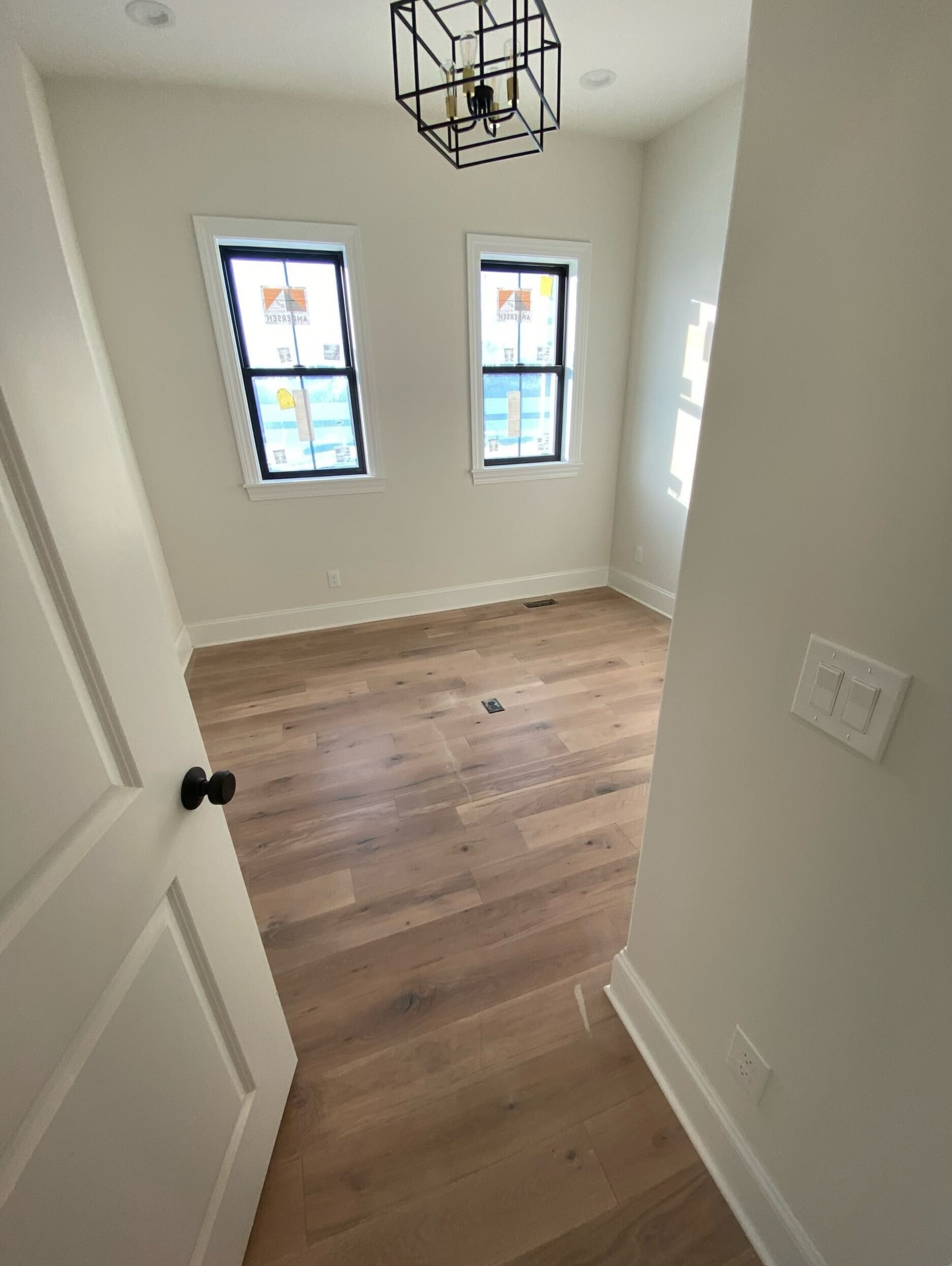 Six-inch white oak, character grade, plain sawn—finished in an antique white that lets the natural variation shine through. Proof that the most timeless spaces start from the ground up. #TimelessFloors #GrafCustomHardwood #BonaStain #OldWorldCustomHomes #SimplyQuartered