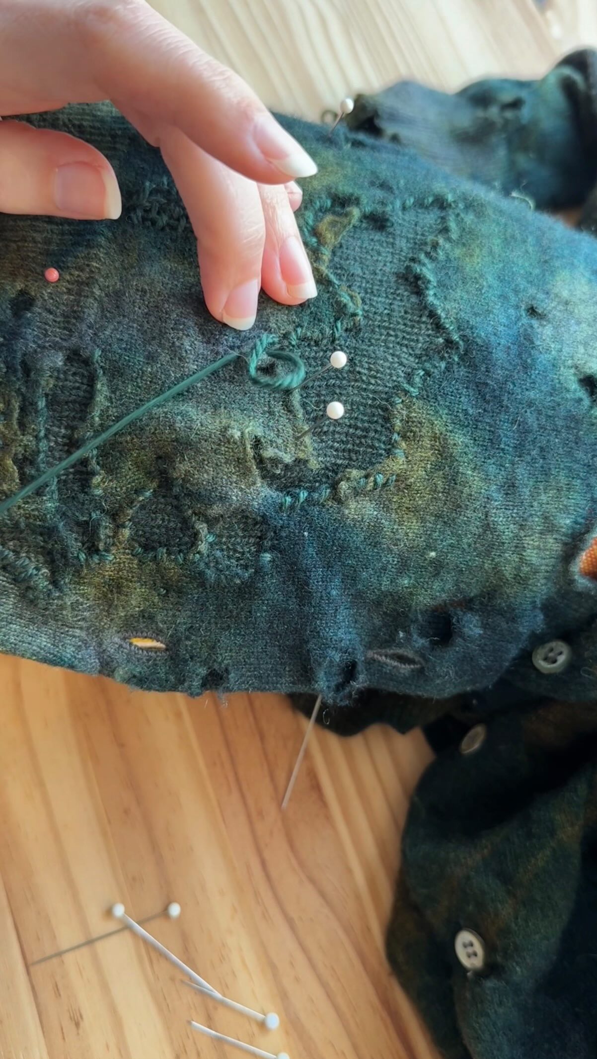 My favorite thing about this upcycled cashmere sweater is the holes. Well first the color, and then the holes. But this one hole in the front was so big that it was effecting the structure and I felt like it needed to be patched so the sweater would last longer.
I’m not a knitter, and I’m still new to darning, so my instinct is always to patch and not to darn. Especially with such a large hole. But I ended up doing a bit of both.
I had this cashmere scarf I’d found at Scrap (with holes of course) so I dyed it to match the sweater so I could use it as a patch. And then I had some silk and wool yarn that I dyed as well. (Maybe later I’ll share a video about the dying process because it had some unusual results).
I’m not making any clothes for QuiltCon this year, but I wanted to finish this mend because I’ll be bringing this worn and loved sweater.
#visiblemending #visibledarning