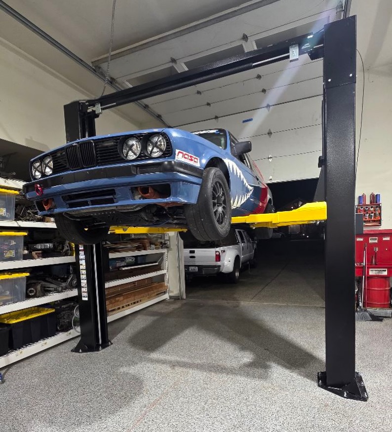 This is how you outfit a personal shop! A @challengerlifts CL10AV3 sold and installed. Proudly made in 🇺🇸, this lift was built to last and has the lowest screw pad height of any lift we sell at 3 7/8”, perfect for your lowered race cars. 🏎️