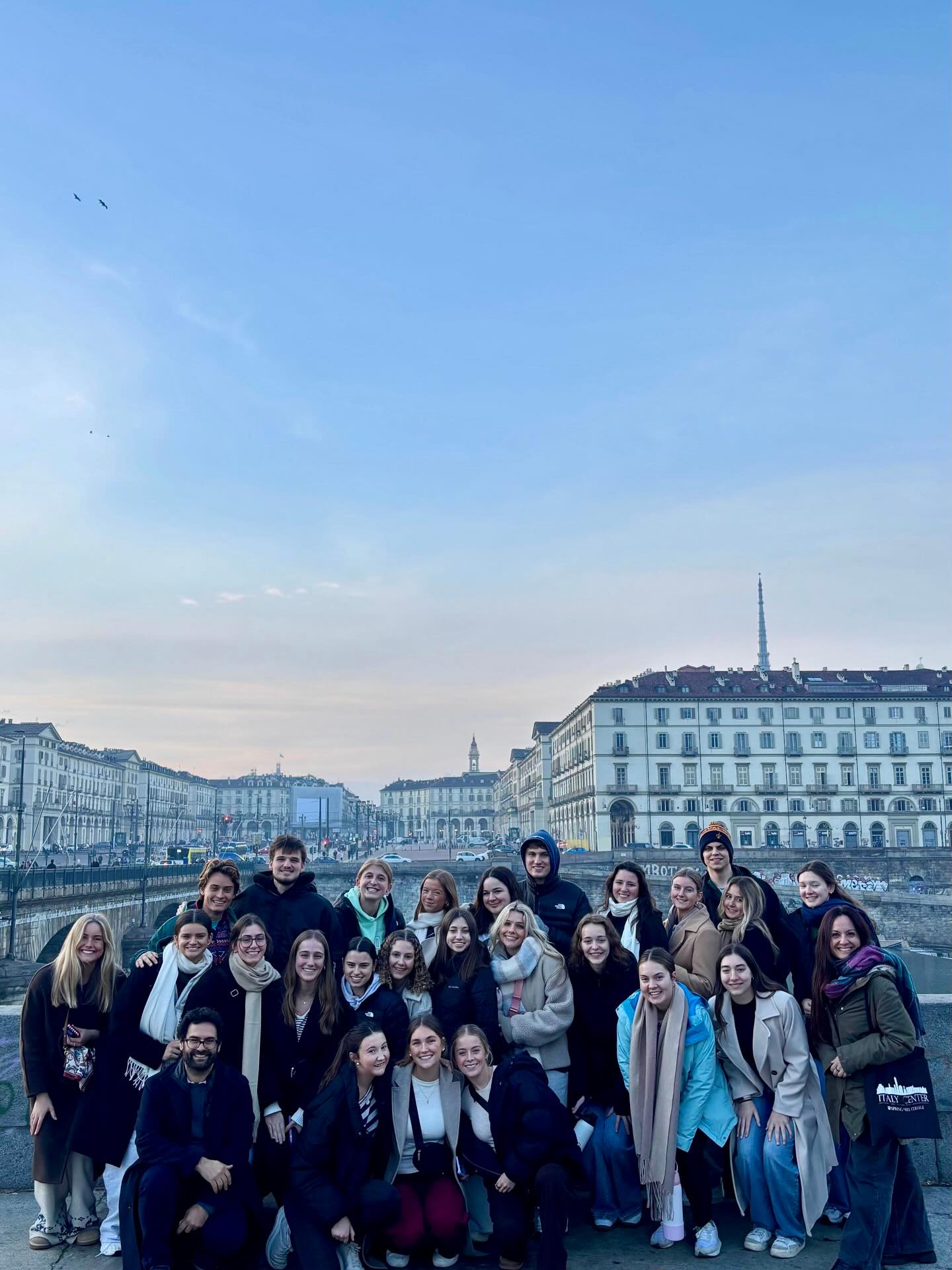Our first Spring ‘26 Social Justice Travel to Turin, Italy was a major success! 🐂🇮🇹🌟
During this four-day experience, we had the opportunity to visit incredible community partners and discover a different side of Italian culture. Our first stop was @fondazionepaideia , where we learned about the support they provide to children and families living with disabilities or chronic illnesses. We toured their welcoming facilities, including a library, swimming pool, playground, and much more!🐳✨🌳
Next, we visited @sermig_arsenaledellapace , a space offering shelter, medical care, volunteer exchange opportunities for young people, and essential support for those in need. Guided by their mission to promote peace, we helped sort donated clothing from the local community to be redistributed to those who need it most.🧣
Our final community partner was @aps_sipuofare , which runs a public residential facility for unaccompanied minors. We spent an unforgettable day together, learning Arabic, playing soccer, football, and card games, and simply getting to know one another. It was an incredible moment of connection for both the young migrants and our cohort.⚽️🖌️
We wrapped up the trip with a walking tour of Turin, learning about the city’s rich history and culture while admiring its beautiful architecture. Even a bit of rain couldn’t stop us, especially tasting local food (including the iconic plin).❤️
Overall, this journey marked the beginning of our hands-on learning about social justice through real-life contexts and meaningful relationships. In just the first orientation week, we immersed ourselves in diversity, culture, and migration, while reflecting on what it means to learn and travel as human beings in a multifaceted, multicultural Mediterranean country.🌟
This is only the beginning for this cohort, and we can’t wait to see what they experience next during their time in Italy.
Grazie to all of our local partners for welcoming us and for the incredible work you do!❤️