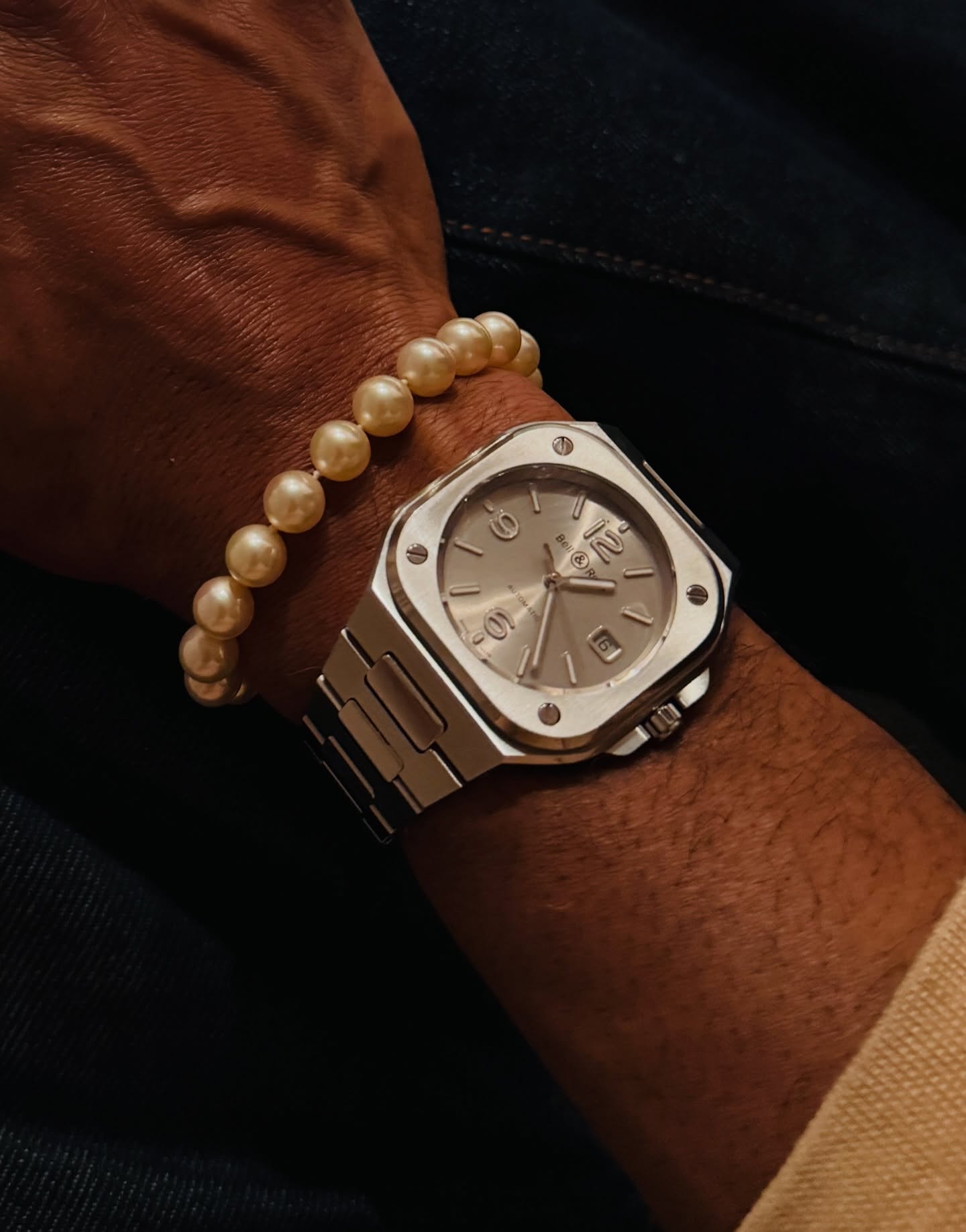 A clean steel case, worn daily.
Paired with a pearl bracelet that once belonged to Jaymz’s mother—
a woman defined by taste, restraint, and presence.
Some pieces mark hours.
Others mark lineage.
Watch: Bell & Ross BR05A-GR-ST/SST
Size: 40 mm | Integrated Bracelet | Full Set
—
#TimeSublime
#WatchAsArt
#HeirloomStyle
#ModernHeritage
#wristgame