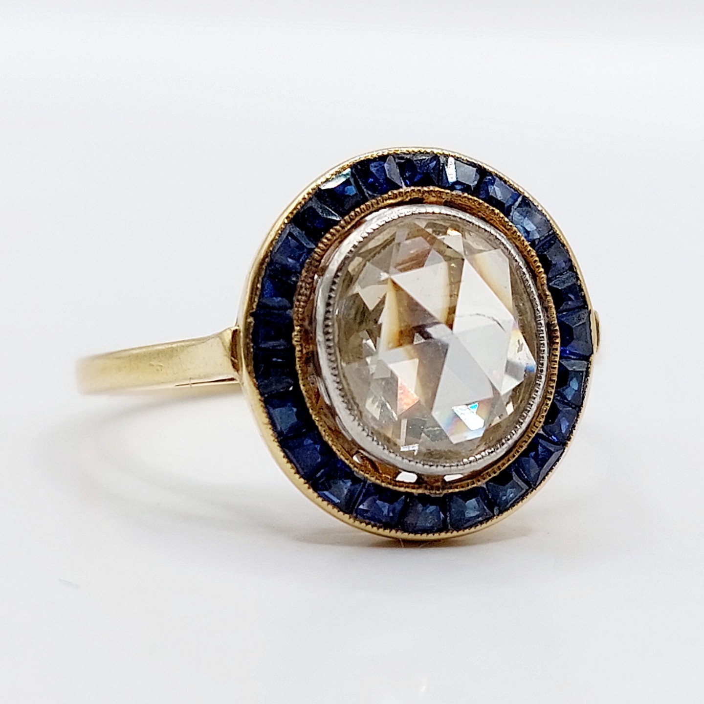 French antique target ring 18k gold and platinum set with a 1.60 carat rose cut diamond surrounded by calibrated sapphires (circa 1920)
PRICE : 3900€
Magnificent and rare antique French goldsmith work
Size: 55 FR / 7 US
Weight: 3.23 g
Diamond size: approximately 8.5 x 7.0 x 3.0 mm (estimated at 1.60 carats)
Diamond in perfect condition, slightly yellow in color, with small inclusions visible under magnification
Ring head size: 13.5 mm
Slight wear to the sapphires visible only under magnification
Micro scratches from use and traces of previous resizing
Eagle head and dog head hallmarks (French hallmarks)
#frenchjewelry #diamond #diamondring #antiquering #victorian #victorianring #marquisering #augustusjewels #vintagering #daisyring #daimondhaloring #tragetring #oldminecut #oldminecutdiamond #oldeuropeancutdiamond
