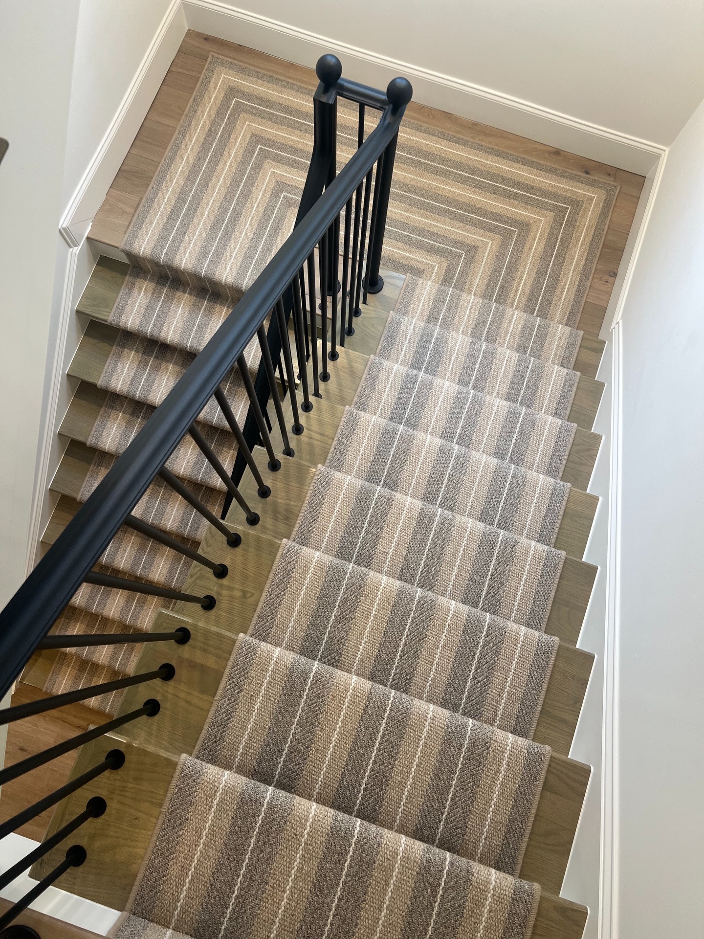 A classic stair moment. A striped hand-loomed wool stair runner that feels tailored and timeless. Subtle pattern, natural texture, and a palette that will never date. Thank you, @laurayeagersmith, for collaborating with us on your project! #TimelessFlooring #PrestigeProjects #StairRunner #SimplyQuartered