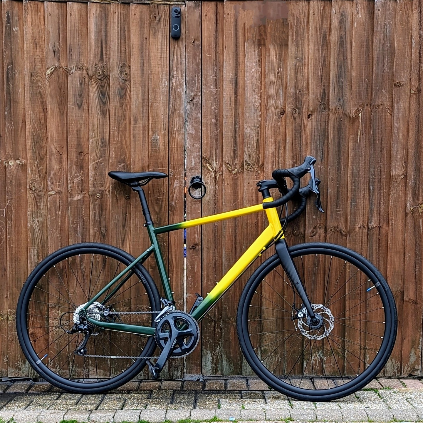 Triban RC120 came in for a new look. Small respray to the frame of green and yellow. With a hint of gold flake. Then finished off with a clear coat as made this a one off. #repairs #spokeshed #bikerepairs #roadracing #cycle #bikes #spray.bike