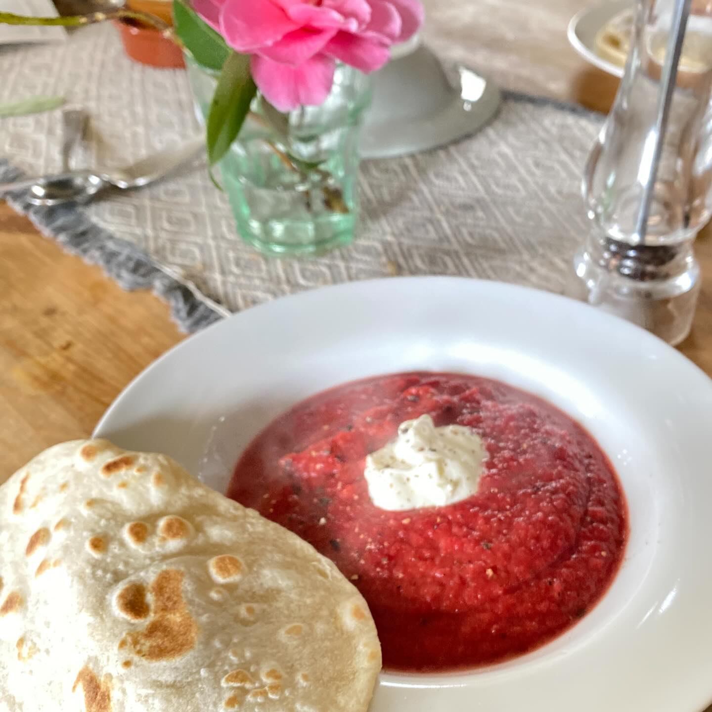 Roasted root veg soup with flatbread.
Delicious and hearty.
Dice/slice up:
2 beetroot
2 parsnips
1/2 swede
2 leek
1 whole garlic bulb
Add to a roasting tray, drizzle with olive oil, sprinkle with salt and pepper, rub in, roast at 200c for 30-40 minutes.
Meanwhile:
Chop up:
1 large onion
1 stick of celery
1 red potato
Add to deep pan with:
olive oil,
50g of butter
Chopped fresh rosemary
Chopped fresh sage
Chopped fresh thyme
(Dried will do if you don’t have fresh)
2 bay leaves
Cook until onions appear glassy.
Meanwhile make up 1ltr of vegetable stock.
Add roasted veg to pan with onions, pour over stock until it just covers the veg.
Bring to the boil then simmer for 15-20 minutes. Remove from heat.
Blend until smooth.
Add salt and pepper to taste.
Serve with a drizzle of cream or a dollop of sour cream and some cracked black pepper, with bread of your choosing.
Oh don’t forget to take the bay leaves out before you blend.
Happy eating. 😊💛
#cookingfromscratch #rootveg #soupoftheday #homecookingisthebest
