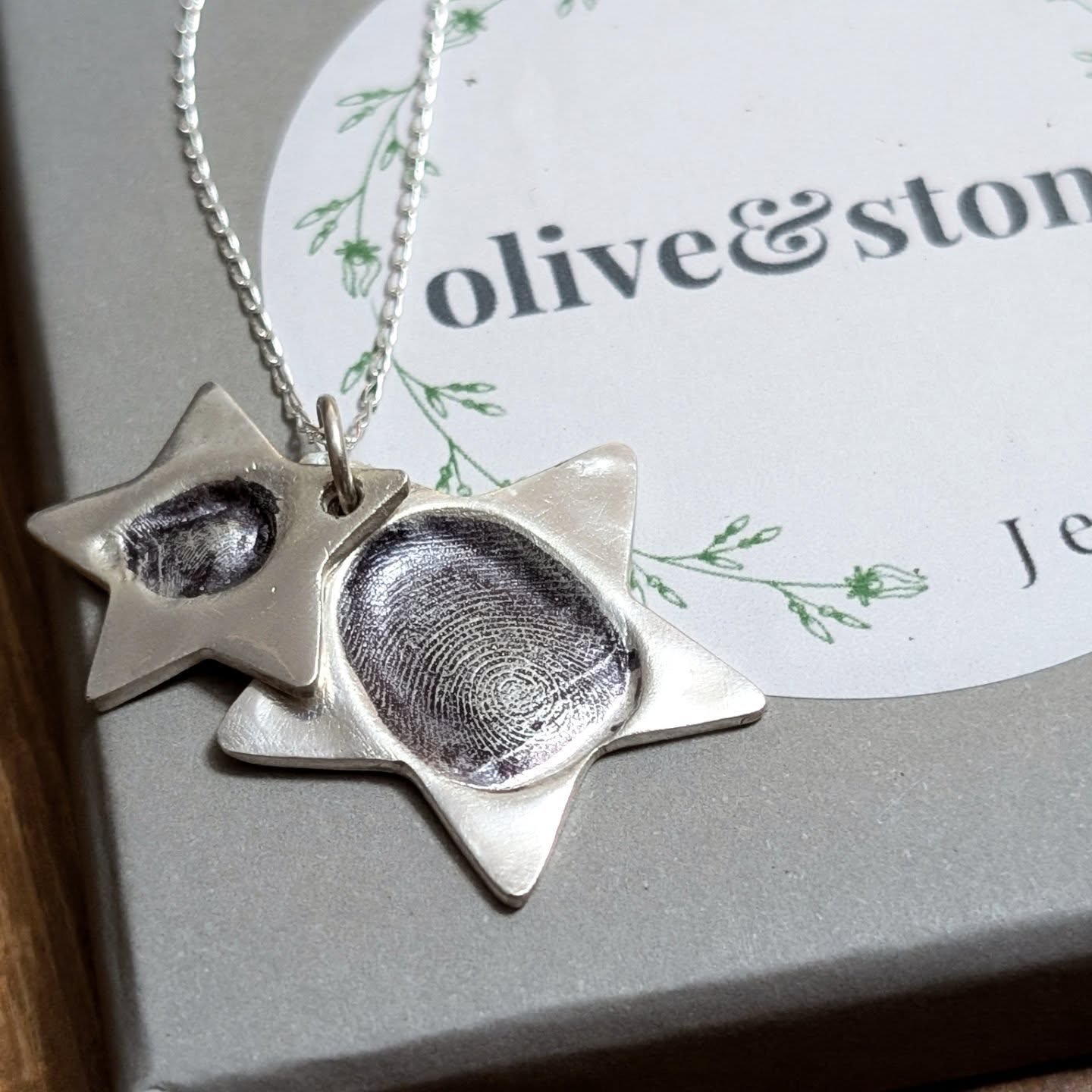✨ There's something so magical and ethereal about stars, so I was delighted to receive an order to hold the fingerprints of 2 sweet children, set into a set of stacked stars and to be gifted to their mum. 🥰✨
Although I love all the different styles of jewellery I make, the uniqueness of fingerprint jewellery is what first got me interested in working with silver. I love how no fingerprint is ever the same as someone else's, which means your jewellery will be a complete one-of-a-kind, just like the special people in your lives. All pendants are hand-engraved and polished by hand too. 🤍
I'm now also making a fingerprint necklace for this customer's neighbour 😂 That is how supporting small businesses work too, social media is great at times, but word of mouth and sharing something you love is just incredible, thank you!
#fingerprintjewellery #keepsake #silverjewellery #handmade #love