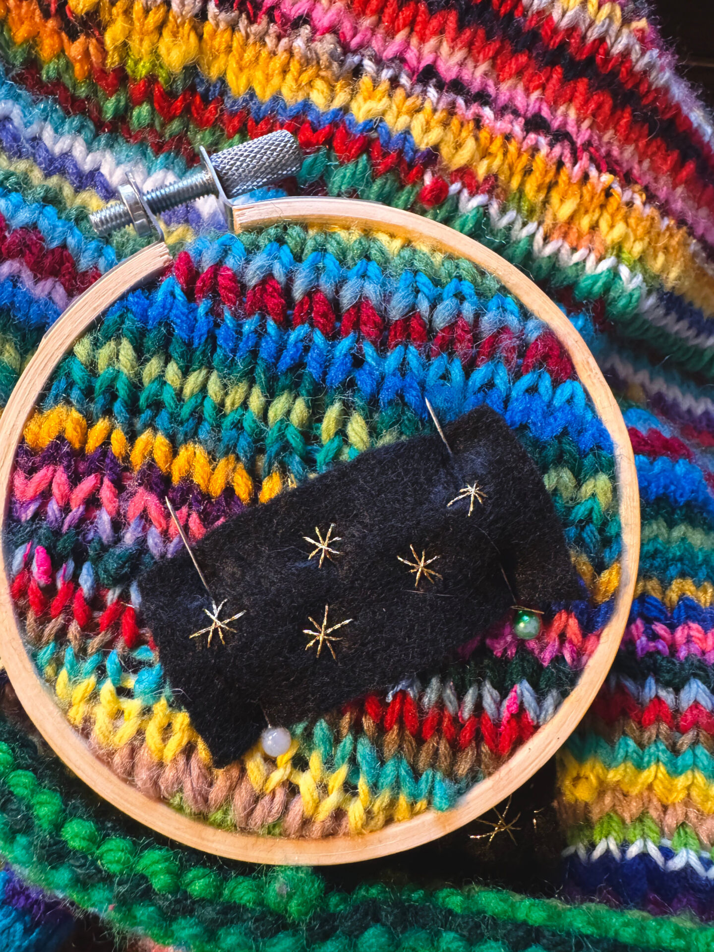 Once again, I am working on this blanket knitted together with bits of scrap yarns and wools. The nature of working with so many kinds of yarns, and joining the ends of these yarns at all phases of the process does mean that holes appear as I knit. To fix the holes, I decided I wanted to sew up the holes and then cover them with black felt embroidered with gold thread.
Read more about this process on my blog! 🔗Link to blog in my bio bio!
*
*
*
*
*
#womanownedbusiness #shopsmallbusiness #handmadegifts #handmade #scrapyarn #scrapyarnproject #knitting #scrapyarnblanket #knittedblanket #feltpatch #gold