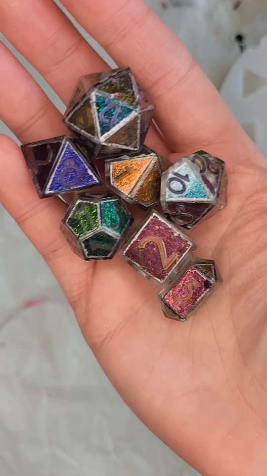 How many different colors do these stained glass inspired dice shift to? We are super happy with how these turned out!
#resindice #demolding #handmadedice #smallbusiness #dungeonsanddragons