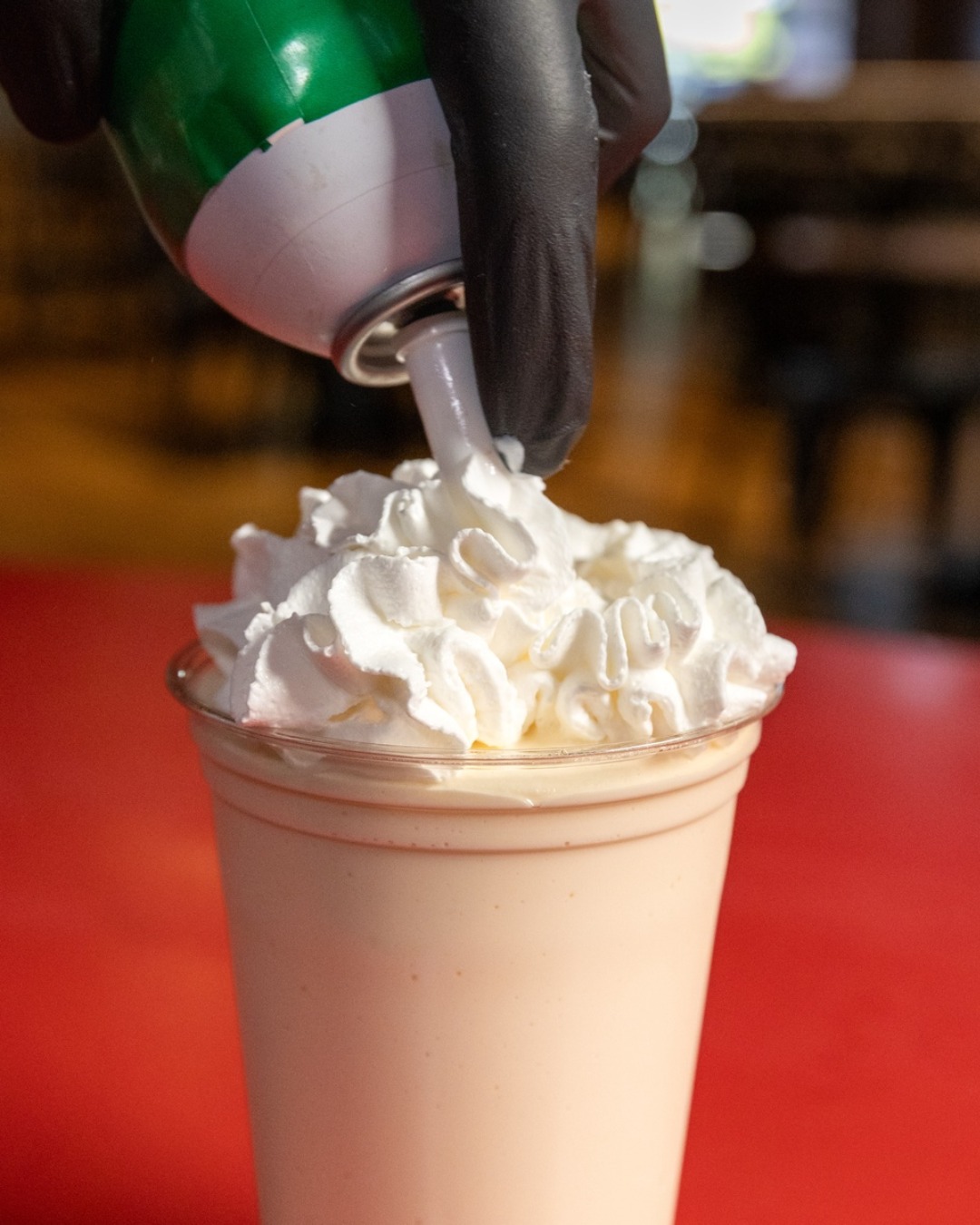 Dessert? With whipped cream and a cherry on top. Totally Smashed has the classics covered: vanilla, chocolate, strawberry, and a local favorite you won’t want to miss, huckleberry. Thick, creamy, and absolutely worth the brain freeze.
Feeling adventurous? Keep an eye out for featured shakes. They rotate often and never miss.