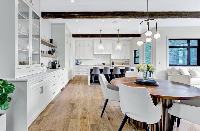 We were featured through Redline Building for the @besthomemag summer edition in 2025! We are honoured to display our Box Beam ceiling beams & mantle in our Walnut standard stain on Barn Board texture for this project.