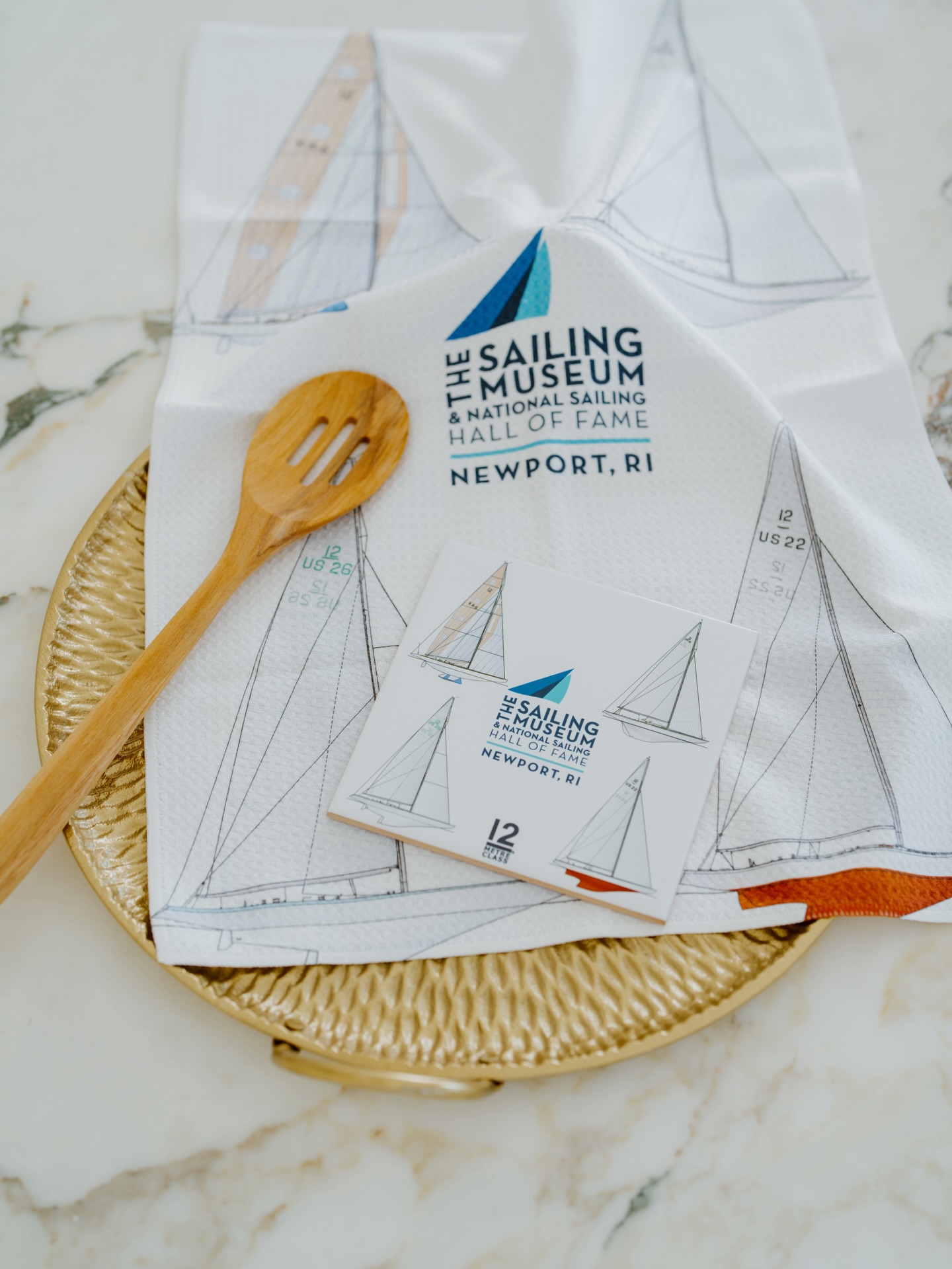 This project began with understanding how museum merchandise is actually experienced.
For The Sailing Museum, that meant designing a product that feels appropriate in the space and practical once it leaves it. The sailboat illustrations, layout, and logo placement were all chosen with intention, balancing visibility with usability.
The goal was simple: create merchandise that fits naturally into everyday life and still reflects the institution it represents. ⛵️