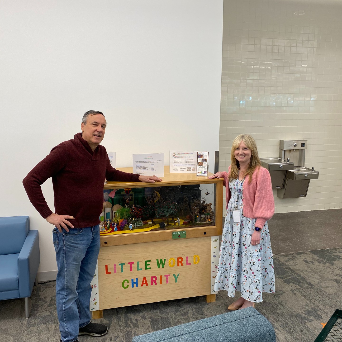 With Carrie Lee, Manager of Eva Perry Library, after installing today. Our first Wake County Library.
