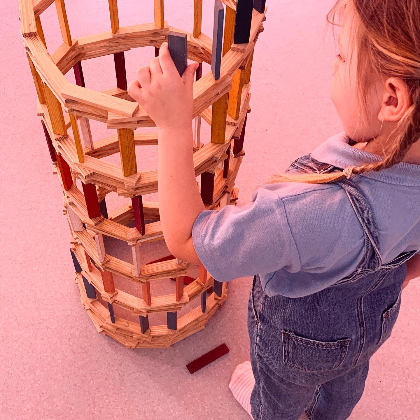 Building higher than you!!! Well done little builder for your perseverance !!!