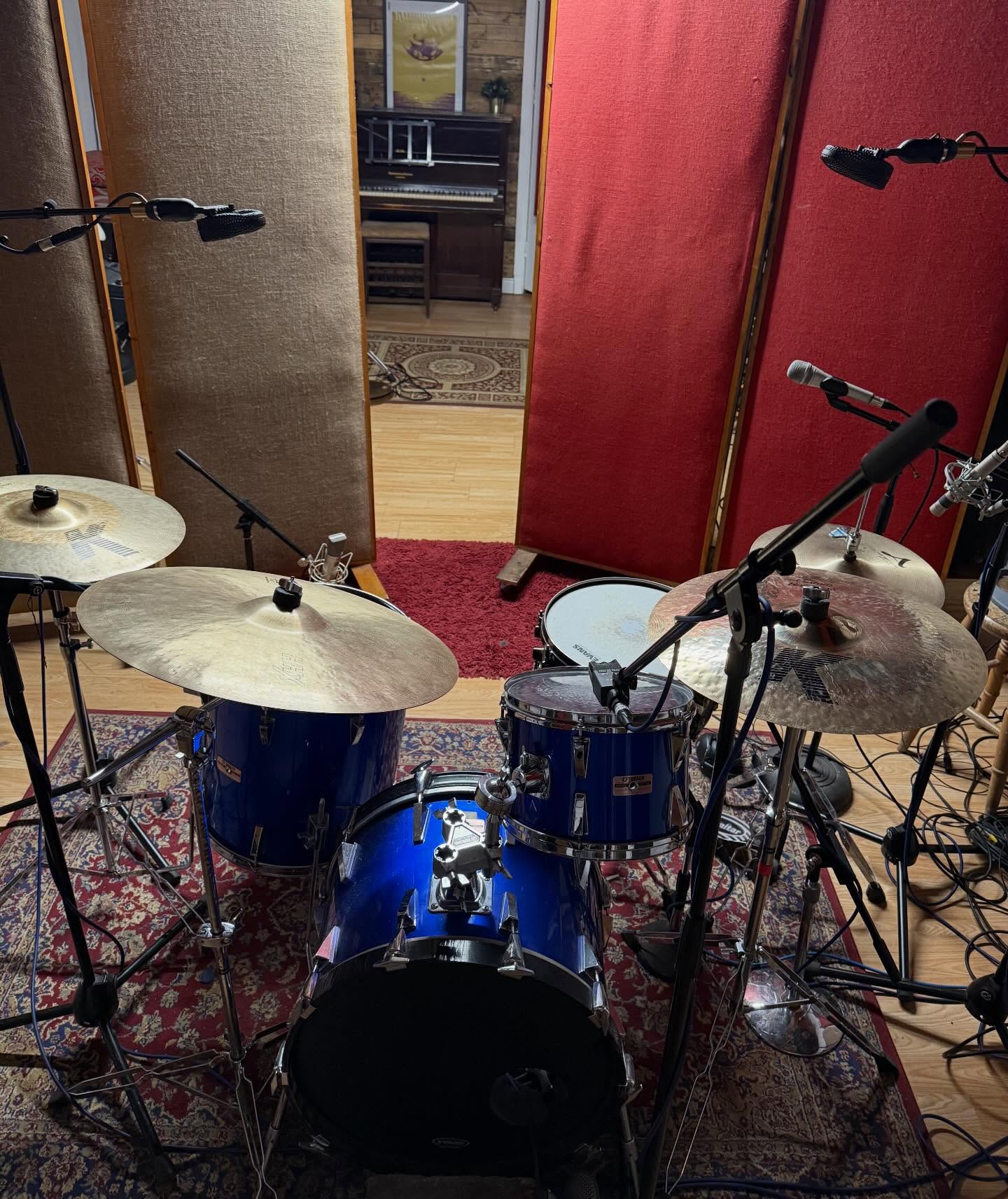 I recorded the drums for a posthumous project of literally one of the biggest legends of all time yesterday. That’s all I can say at the moment I’m afraid!
The drummer / producer of this project wanted a deader, darker and more 70s drum sound than my usual. So I swapped out the overheads for my pair of Cole’s 4033 and there it was straight away. They captured the low tuned thuddy snare perfectly and gave the cymbals that hi shelf they needed. At first they were a little roomy (due to their figure of 8 nature) so I pulled the gobos in at the back of the kit to deaden the general space of the kit. That did the trick.