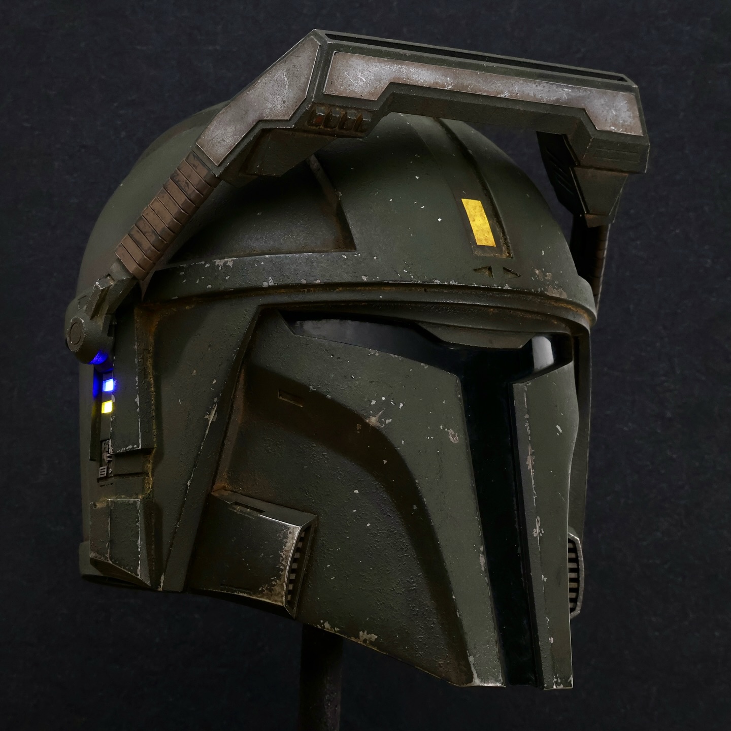 Letting go of one of my favourite helmets. First link in my linktree in bio will take you to the listing on my website. Free shipping to Canada and US.
Info about the helmet:
In 2013 I acquired an authentic WWII US M1 helmet that belonged to a Second Lieutenant who wore it in the Pacific Theatre in WW2 (see last photo). As a nod of reverence for this incredible piece of history, I wanted to replicate its look on one of my own helmets, the Recon Large, and this is the result.
Helmet is lined, padded with adjustable padding, and ready to wear. It measures 9.5” from ear to ear, and 10.5” front to back. It is made from Smooth-Cast 65D and ONYX resins infused with aluminum powder; the metallic damage you see isn’t painted on, but a result of the paint job being physically scraped off to reveal a realistic metallic surface underneath. The visor window colour is dark green.
The removable MHAS Macrobinoculars are 3D printed in PLA however, so there the damage is mostly painted on. The blue and yellow LED lights in the ears (9v battery included) are paying homage to my homeland and culture 🇺🇦 and the current moment in history.
Now for the quick in-universe background story of this M1 Recon Large: bucket was recovered from the body of a fallen Mando commander defending his home world from the Empire during the Night of a Thousand Tears.
Thanks for looking!
#mynocksden #mandalorianhelmet #custompaintjob #cosplay #customprops