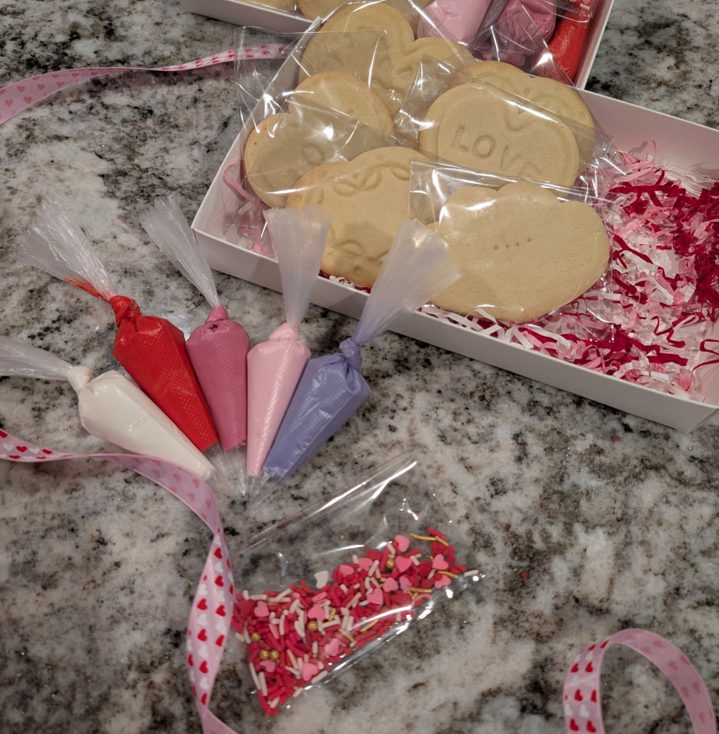 🚨discount alert - read to the bottom!
Valentine's Pre-order Spotlight: DIY cookie kits $16/each
These cute little kits include everything you need to decorate your own DELICIOUS cookies at home. These are perfect for your kiddos or maybe even a Galentine's gathering!
Place your pre-order today and pickup 2/13 or 2/14.
All of my followers will get a $2 discount PER cookie kit. Just mention this post when ordering!!