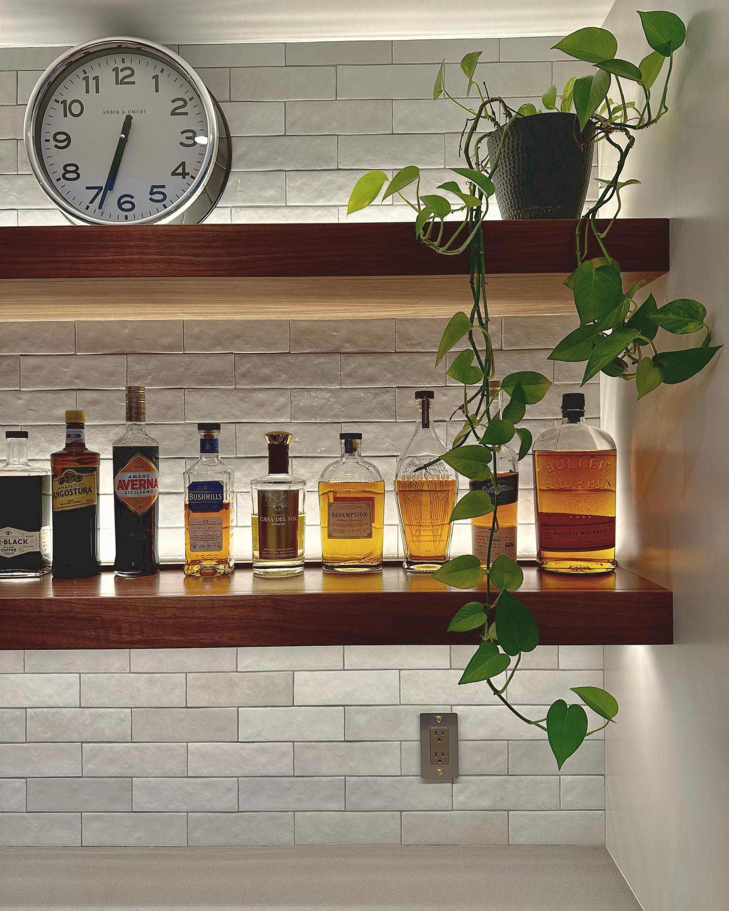 It’s that time…sneak peek of a newly completed kitchen project. Bar area using @ultracraftcabinetry floating walnut shelves and cabinetry @bedrosianstile Chloe Tile and @pentalquartz Paloma Honed