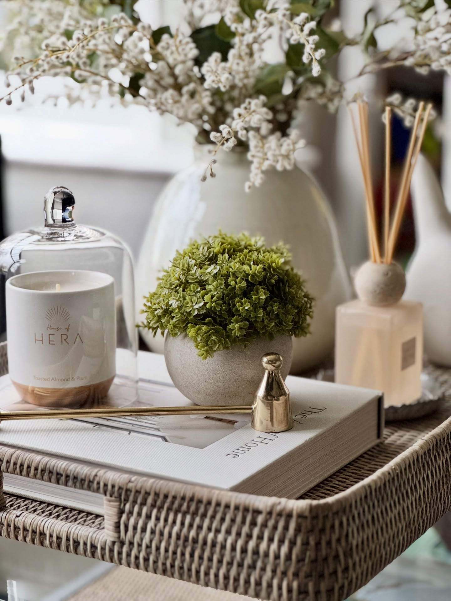 Spring styling, served beautifully 🤍🌿
Our coffee table tray is all about soft textures, calming neutrals, and thoughtful details, from the Grey Rattan Ottoman Tray and The Art of Home Styling book by Shea McGee, to the delicate Hebe Pot, Glass Candle Dome, and our White Stoneware Sparrow. Finished with our Petra Reed Diffuser, White Glaze Vase, and Faux White Willow with Eucalyptus sprays for effortless seasonal charm.
A little moment of calm for your everyday living
#BoxwoodHomeInteriors #springstyling #coffeetablestyling #styledliving #seasonalstyling