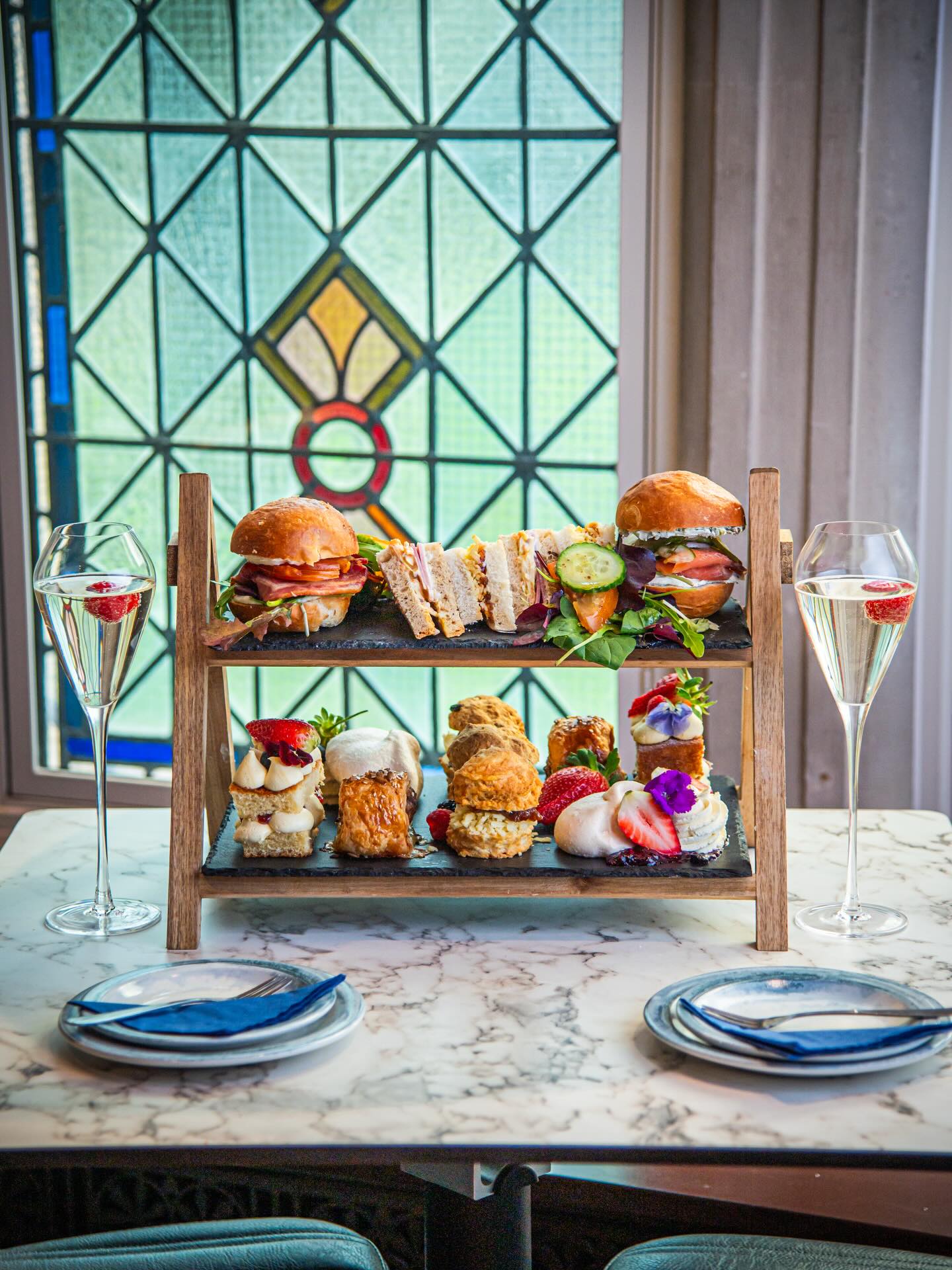 🌸 Mother’s Day Afternoon Tea 🌸
For the first time EVER, we’re taking bookings for Mother’s Day Afternoon Tea 💐
✨ What’s new?
Avonfield at the Nursery will be open as usual, plus we’re opening our second location at the Old Town Hall exclusively for pre-booked afternoon teas on Mother’s Day.
🫖 Mother’s Day Afternoon Tea
£35 per person
(Pictured: a board for 2 people)
Each board for 2 people includes:
• Salmon & cream cheese milk bun
• BLT milk bun
• Cheddar & chutney sandwiches x2
• Ham & slaw sandwiches x2
• Mini sausage rolls x2
• Mini fruit scone with jam & cream
• Mini plain scone with jam & cream
• Mini cheddar scone with cheese & chutney
• Victoria sponge x2
• Meringue with fresh cream & fruit x2
☕ Tea / coffee / cold soft drink included x 2
🥂 Prosecco + £3 per person
⏰ Service times: 11:30am – 3:00pm
📩 How to book
Send us a DM with:
• Booking name
• Preferred seating time (between 11:30am–3pm)
• Number of guests
• Email & contact number
Bookings are first come, first served. We’ll respond and confirm your booking in the order messages are received.
💳 Deposit
A £10 non-refundable deposit per person is required to secure your booking. This will be deducted from your final bill but is non-refundable in the event of cancellation.
⚠️ Please note: We will never ask for your bank details or request payment to any third-party or alternative accounts. All deposit details will be shared directly by us once your booking has been confirmed. If you are ever unsure, please double-check with us before making any payment.
💐 Takeaway
Mother’s Day Takeaway afternoon tea boxes are still available - please DM for information and orders.