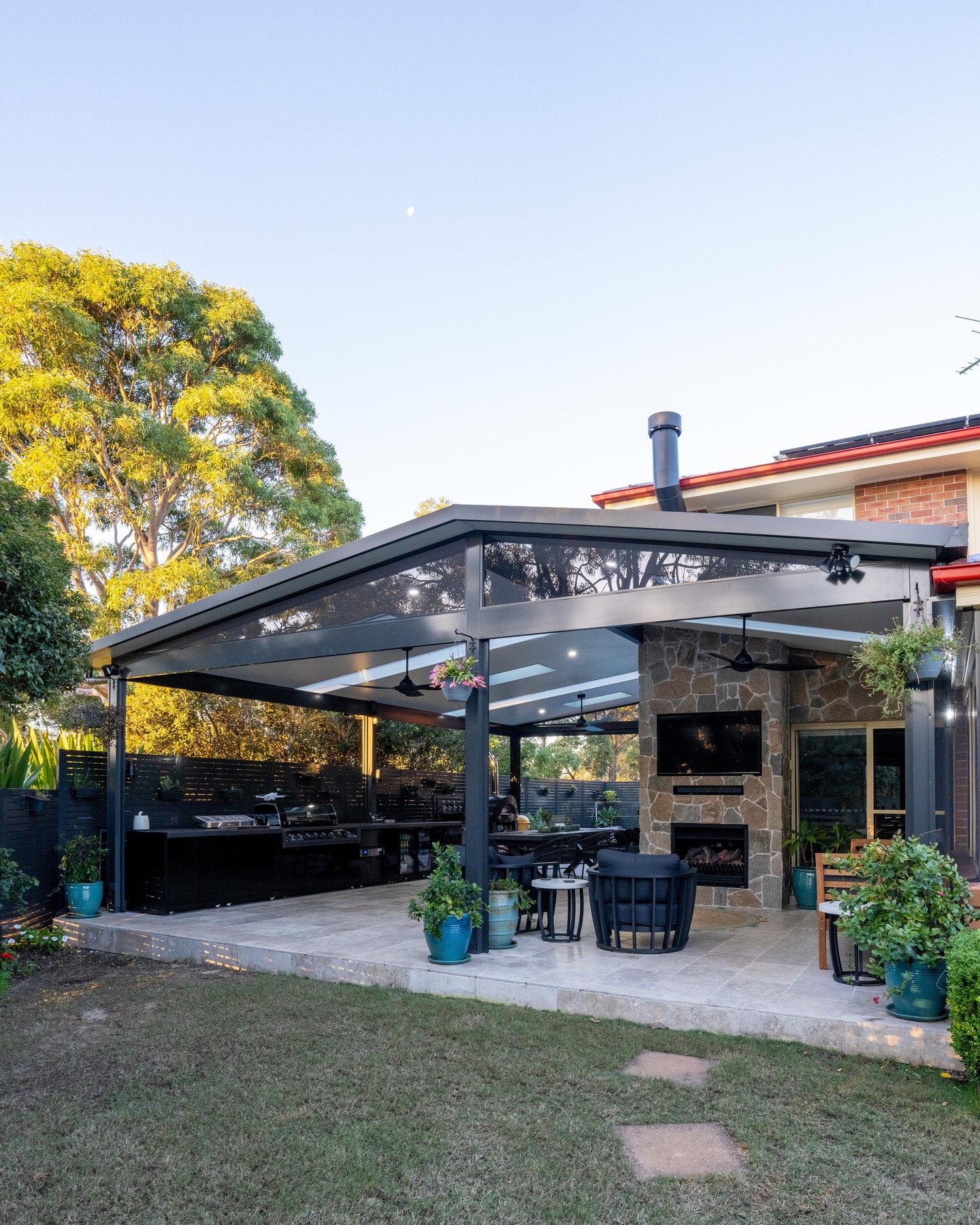 This patio has it all!
Skylights galore for ample natural light, the outdoor kitchen of your dreams with BBQ, pizza oven, drinks station & fridge, a dining space, a lounge space with fireplace and a jacuzzi to boot!
Speak to us about building your dream patio - the sky's the limit!
www.lifeoutdoors.com.au
0414 415 238