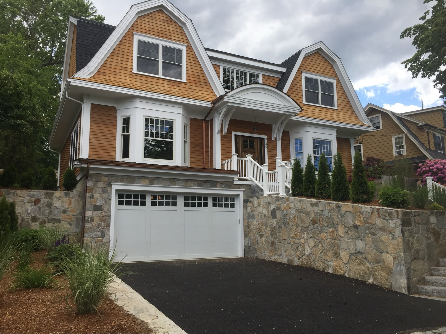 One of our favorite builds to date, this Dutch Colonial perfectly balances classic charm with thoughtful modern touches. ✨
From the front elevation, the traditional Dutch gabled roof, symmetrical windows, and welcoming entry create a timeless curb appeal that feels both grand and approachable. Around back, the rear elevation opens up to the landscape with expansive windows and carefully placed terraces, connecting indoor living spaces seamlessly to the outdoors.
We loved how this home blends into its landscape—every line, every angle, and every material choice was made to feel naturally at home among the surrounding trees and topography, making the architecture feel like it’s always belonged there.
A true example of how classic design and thoughtful site integration can come together beautifully. 🏡
#architecture #echelonbuilders #dutchcolonial #luxuryhomes #customhomes