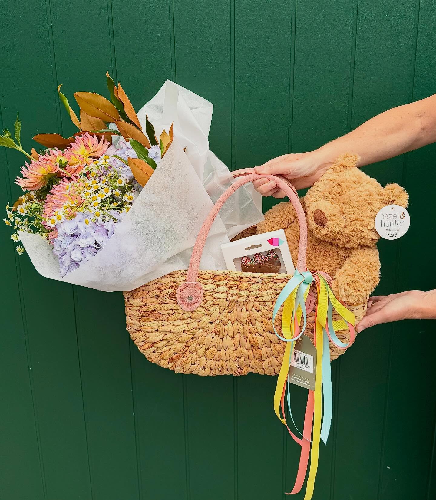 A sweet Valentines gift featuring a charming Robert Gordon Harvest Basket, a bunch of pastel blooms, chocolate tulip and a cuddly Teddy bear-the perfect mix of sweetness, softness and Love.🧸