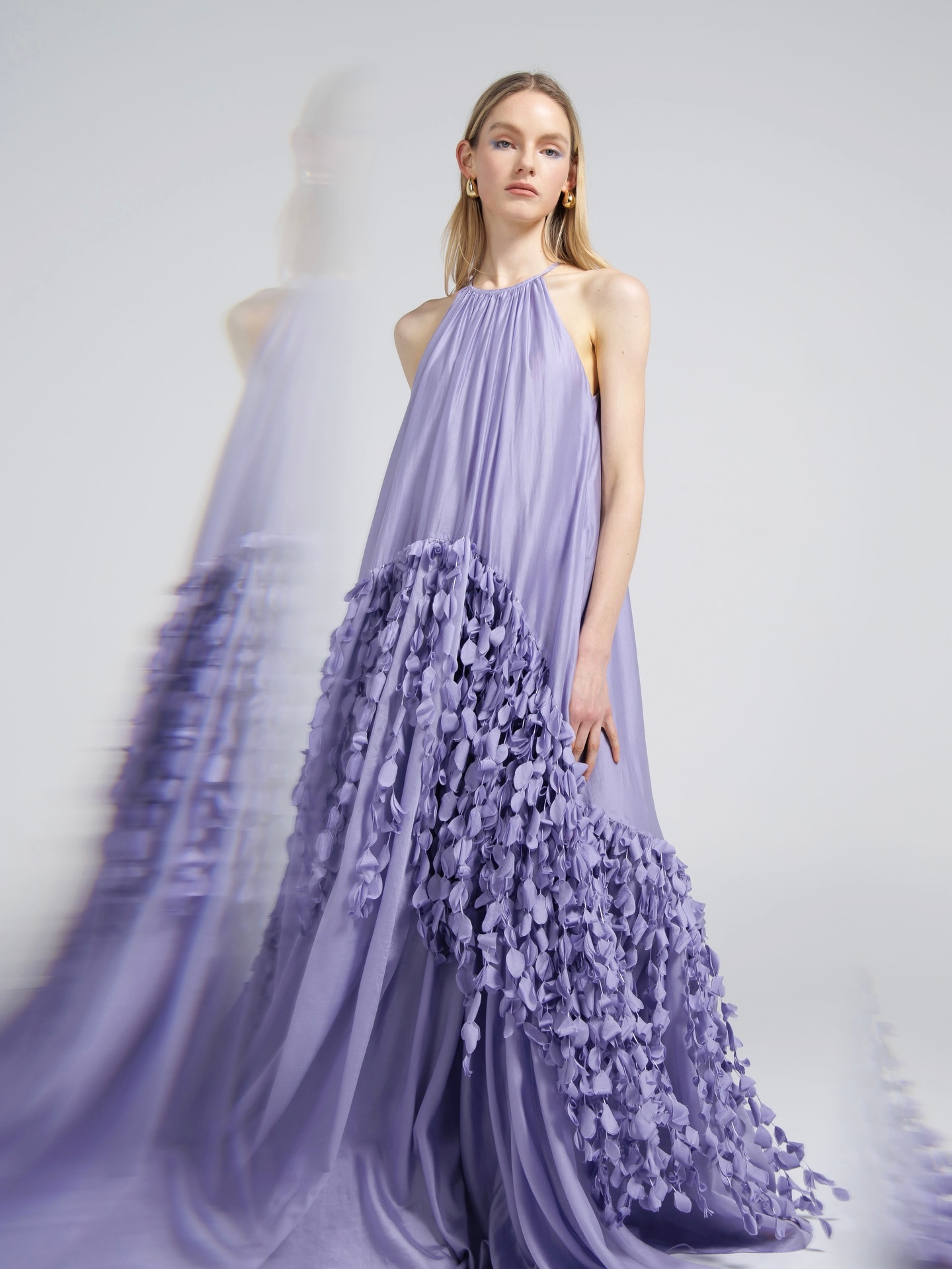 DESIGNED WITH INTENTION
Petal Drift High Neck Gown
Available at VICETAWANG.COM