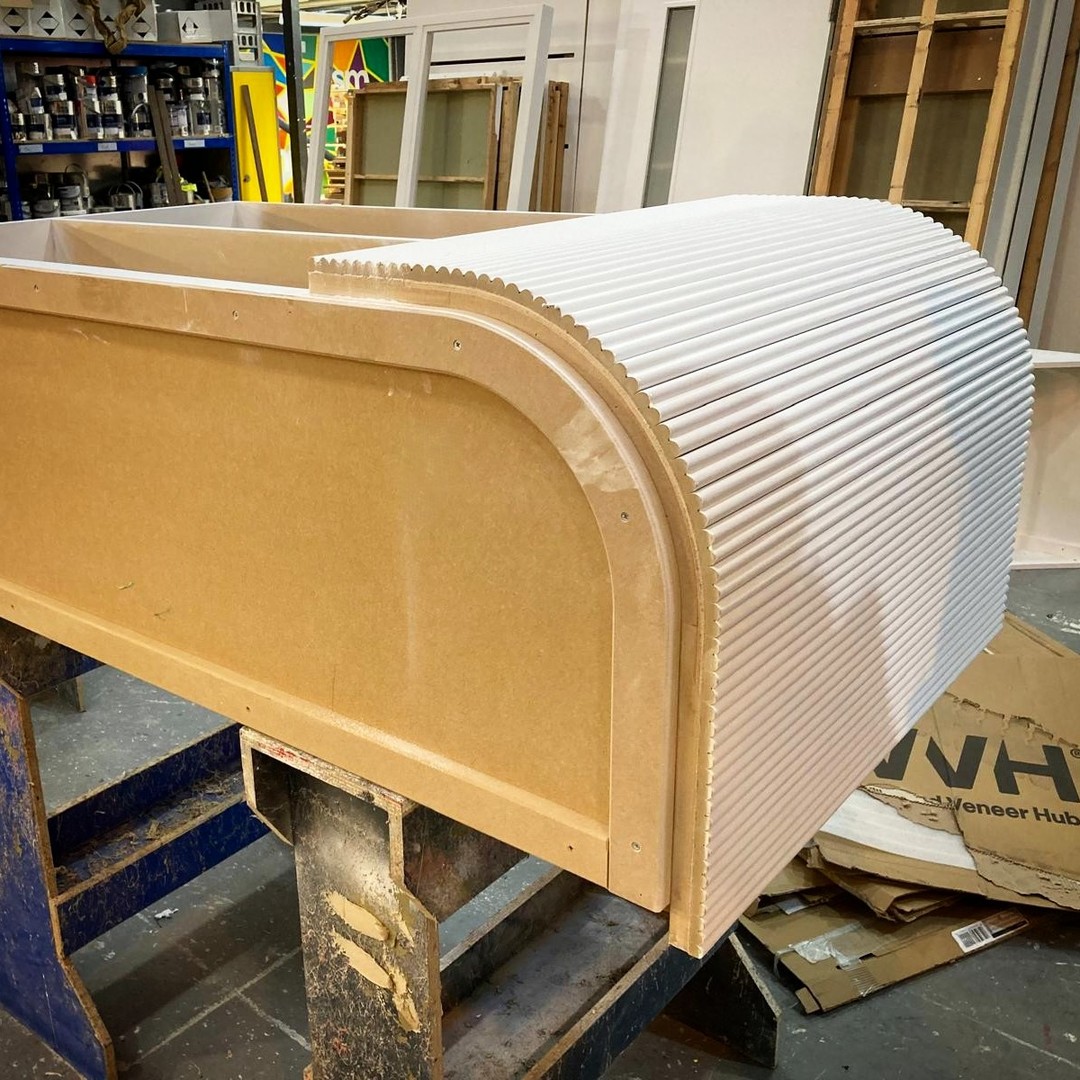 Our expert craftsmen are back in the workshop, hard at work. Here's a little sneak peek at what we're up to...
It's not much to look at now, but all beautiful work has an ugly stage! Once this accupanel-covered counter section has been fully prepared and primed, it'll be ready for spray-painting and finishing, before being carefully wrapped and transported to site for installation.
With a number of showroom fit-outs on the horizon, it's all hands on deck in our decorating department at the moment!
Is your company looking for a trusted partner to design, manufacture, install or project manage similar work?
Drop us a line on 01795 713086 or email sales@esm-uk.com to discuss your requirements today.
#behindthescenes #bts #decorating #workinprogress #wip #workshop #painting #uglystage #manufacture #design #build #install