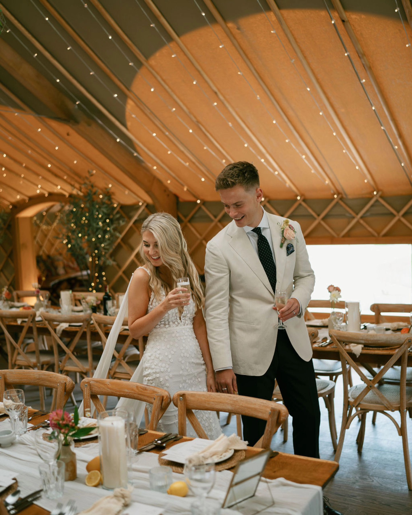 We always love to see "first look" photos. If you've invested a lot into your wedding breakfast styling (that's time and effort as well as money), popping in to see it all looking beautiful before your guests (and therefore their coats, handbags, empty glasses etc 🤪) is always nice.
Love this shot of the gorgeous E&S doing just that ❤️
Photography @toriafrancesphoto
Venue @thorpegarden
Florals @flowers.in.the.wild
Styling by us