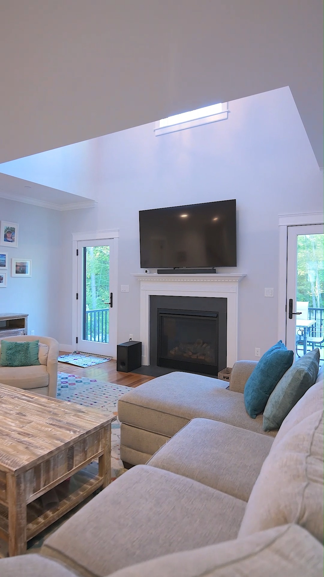 Step into flow! ✨ Vaulted living, cozy fireplace, sunlight. Seamlessly into the navy island kitchen; open, effortless. Then, through French doors to a private, bright home office.