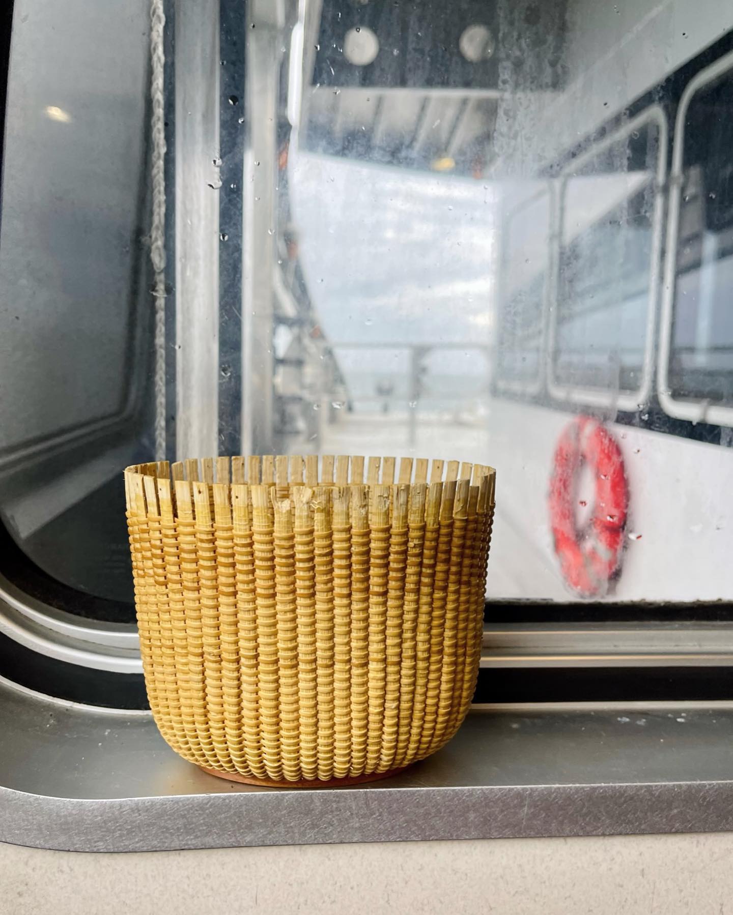 Brought this cute little tote off island for a repair. Can you guess who took a bite out of this one? 🤫