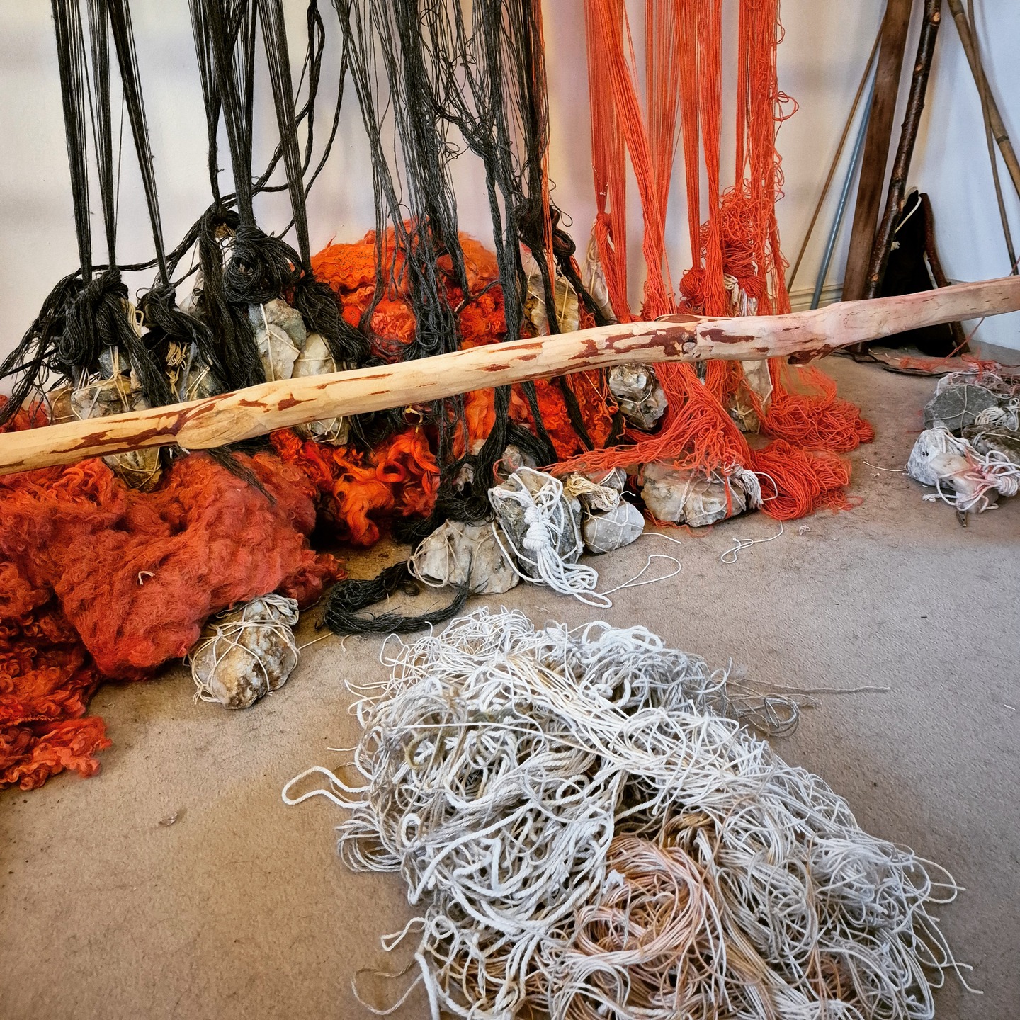 Not all "work in progress" photos are of triumphs! Sometimes progress is non-linear, and we need to take a few steps back and start again.
My first attempt at setting up the loom for a 2/1 twill has been a bit of a non-starter, and after weeks of trying to piece together different advice and instructions, I've decided that the best way forward is to start afresh!
Here you can see the removed heddles in a heap at the foot of the loom. Normally I would untie them all and reuse the string, but as I'm pressed for time, I cut them off instead. I will reuse all the shorter pieces of string for tying up warp, etc.
I've learned a lot from this experience so far, and I'm looking forward to having another go from scratch, making sure that the cloak is as authentic as possible!
#weaver #handwoven #irishmantle #ancientweaving #experimentalarchaeology