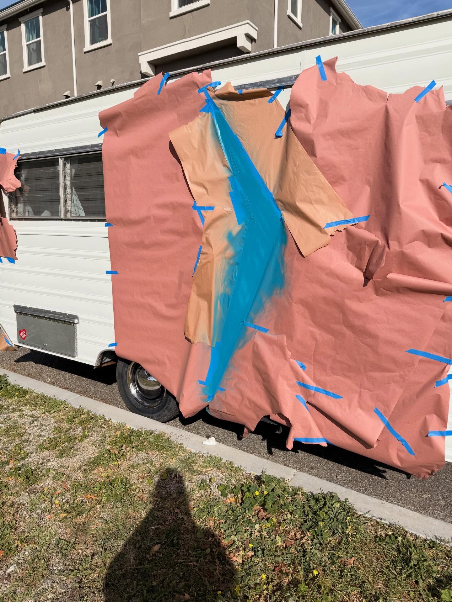 My process…Not pretty. But I like the result. I have wanted a chevron on my trailer door for so long. I definitely need to touch up the white area now though.🤷🏼♀️