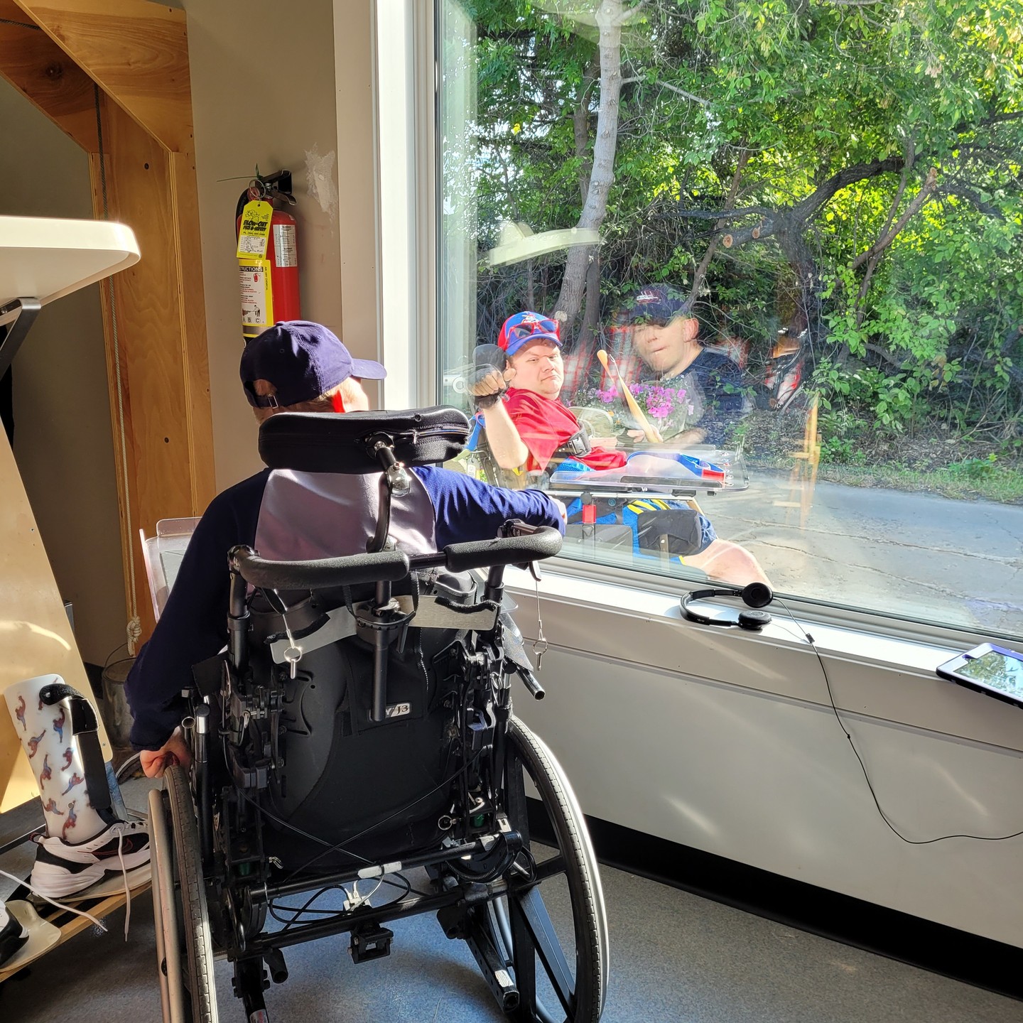 Mike and Tim enjoying the large picture window that was installed in our Opportunities room over the summer. It really brought a lot of light and nature in and opened up the space! Your donations on #givingtuesday can help fund future projects like this one.