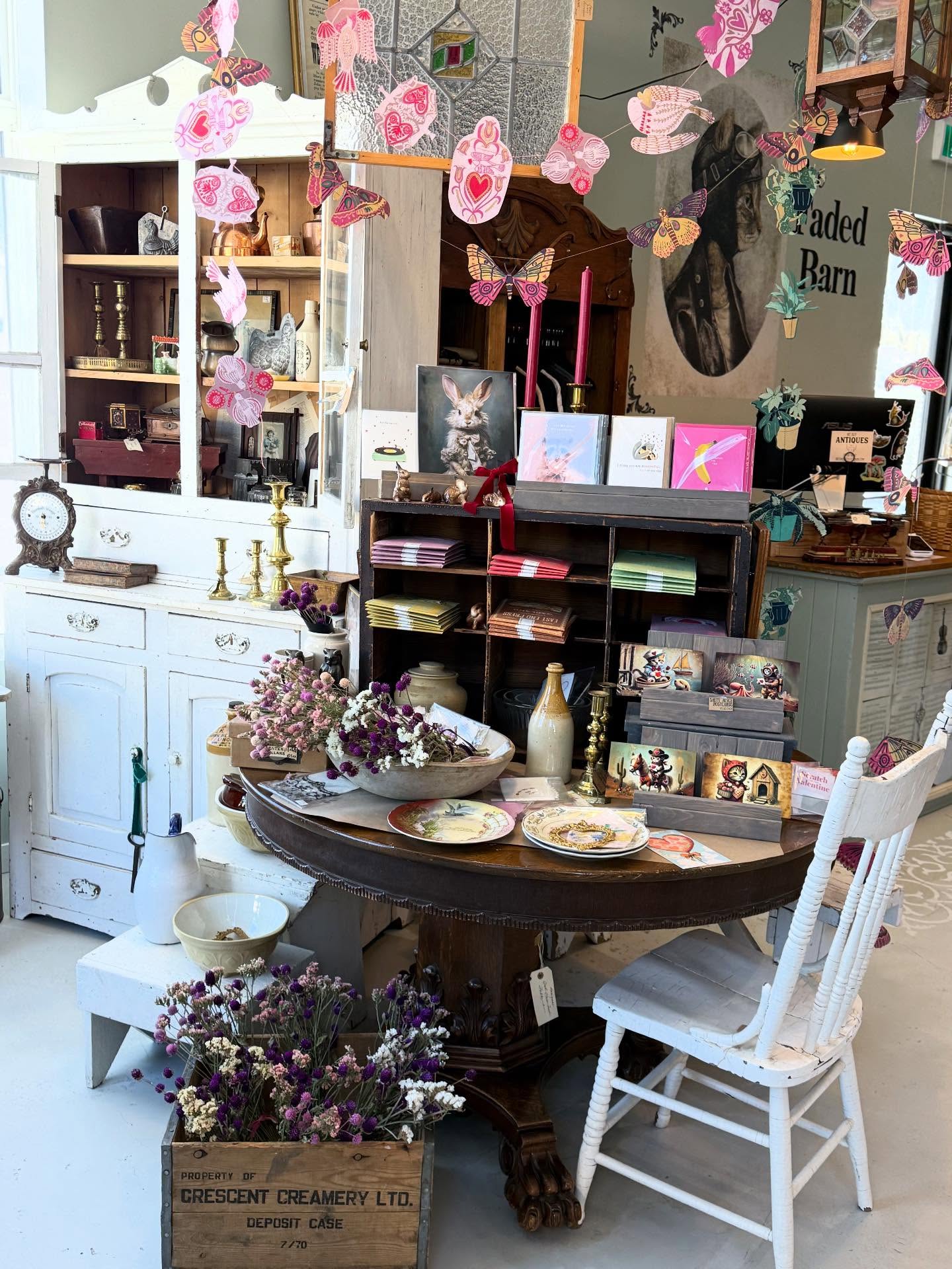 Last fall we picked this beautiful Gomphrena from our Goosepatch for their Valentines debut…. Simply tied with velvet ribbon is all they needed. We have lots of great cards and paper for Valentines too! Our shop is fully stocked with all our new Artisan T shirt brands….
We are OPEN this weekend…. Our
Winter Shop refresh is done…. And Pineridge Hollow restaurant is open this Saturday after their full renovation….its going to be a lovely weekend.
#antique #antiquehome #vintagestyle #vintagehome #vintageinspired