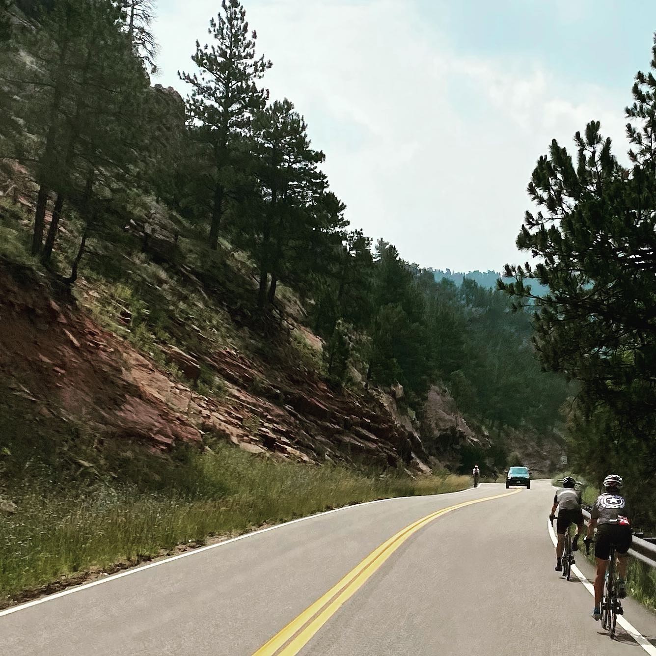 Closeup view of #bikes and cars being safe! Downhill single file and uphill car giving the bike 3’ when passing. #bikesbesafe #leelhilldrive #bouldercounty
