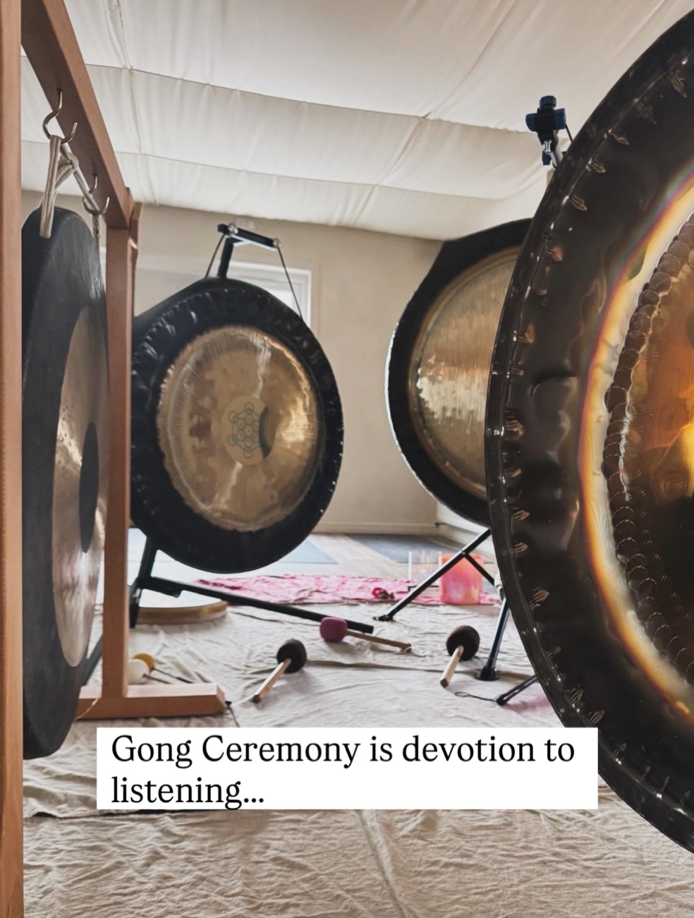 This time last week we were in a spaceship.
Which is the circle of gongs a player sits inside…
and I’m still finding the words to tell you about it.
Last week we stepped into one of those rare spaces that only exists when people agree to listen deeply together. An all night gong, and honestly… to say these spaces are quite something is an understatement.
No gong ceremony is ever the same, each one is alive and unrepeatable. It’s a sharing between the gongs, the players, and everyone who gathers. Something that only exists for those hours… but it keeps echoing in you long after you’ve gone home. I’m pretty sure I was vibrating for *days*.
The shifts since then have been gentle but strong, rearrangements that arrive in the body before you have language for them, maybe beyond words. A co creation between you and the gong, you and life, you and everyone in the room.
Most of us meet sound in shorter sessions, and those are beautiful. But ceremony is devotion to listening, it gives the mind somewhere to rest so your inner world can speak.
I’ve said it before but! Sound doesn’t heal, it reveals. It shows you where you’ve been holding
and lets life move again.
Through the night the gongs hold a field we could simply BE inside. Everyone their own inner exploration but held in a shared vibration.
It is gentle, powerful, special… and if you’re reading this, it is for you.
These spaces hold everyone. First timers, healers, teachers, tired parents, curious humans. If you ever find yourself at a gong ceremony, just know you are exactly where you’re meant to be.
And honestly… they’re magic. But don’t take my word for it:
“I don’t have words to describe what happened… but something in me settled that hasn’t settled in years.”
“I came tired, guarded and really tightly wound. I left clearer and strangely more myself. I can’t tell you how. I just feel more at home.”
“I don’t know what to say… weird, magical, restful, beautiful, and you held it so well.”
🤍
.
.
.
#gong #spiritualgrowthjourney #soundhealing #ceremony #selfhealers
All night gong / events / south London / restful practice