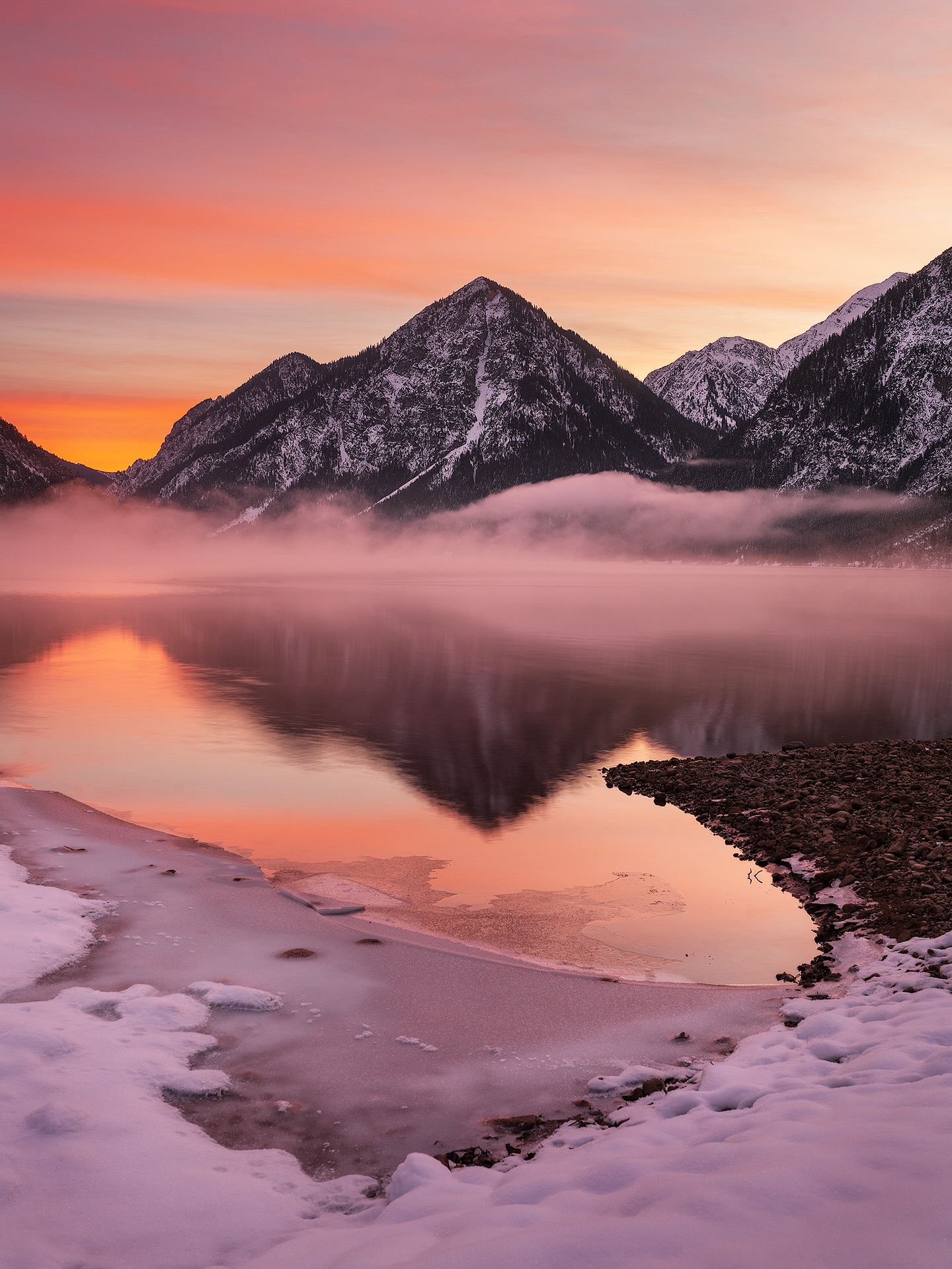 *
Morning Glow over the Silent Lake 🇦🇹
A cold morning in Tirol, painted in soft shades of red and orange. The first light of dawn ignites the sky while a thin layer of mist drifts quietly across the lake. For a brief moment, everything feels perfectly still — mountains, reflections, and winter silence blending into one peaceful scene.
Exif: 33mm · 1.6 Sec · f/11 · ISO 64 · Sony Alpha 7R IV · 16–35mm f/2.8 GM II · Tripod used · GND filter used
#tirol #mountainlake #sunrisephotography #mistymorning #landscapephotography