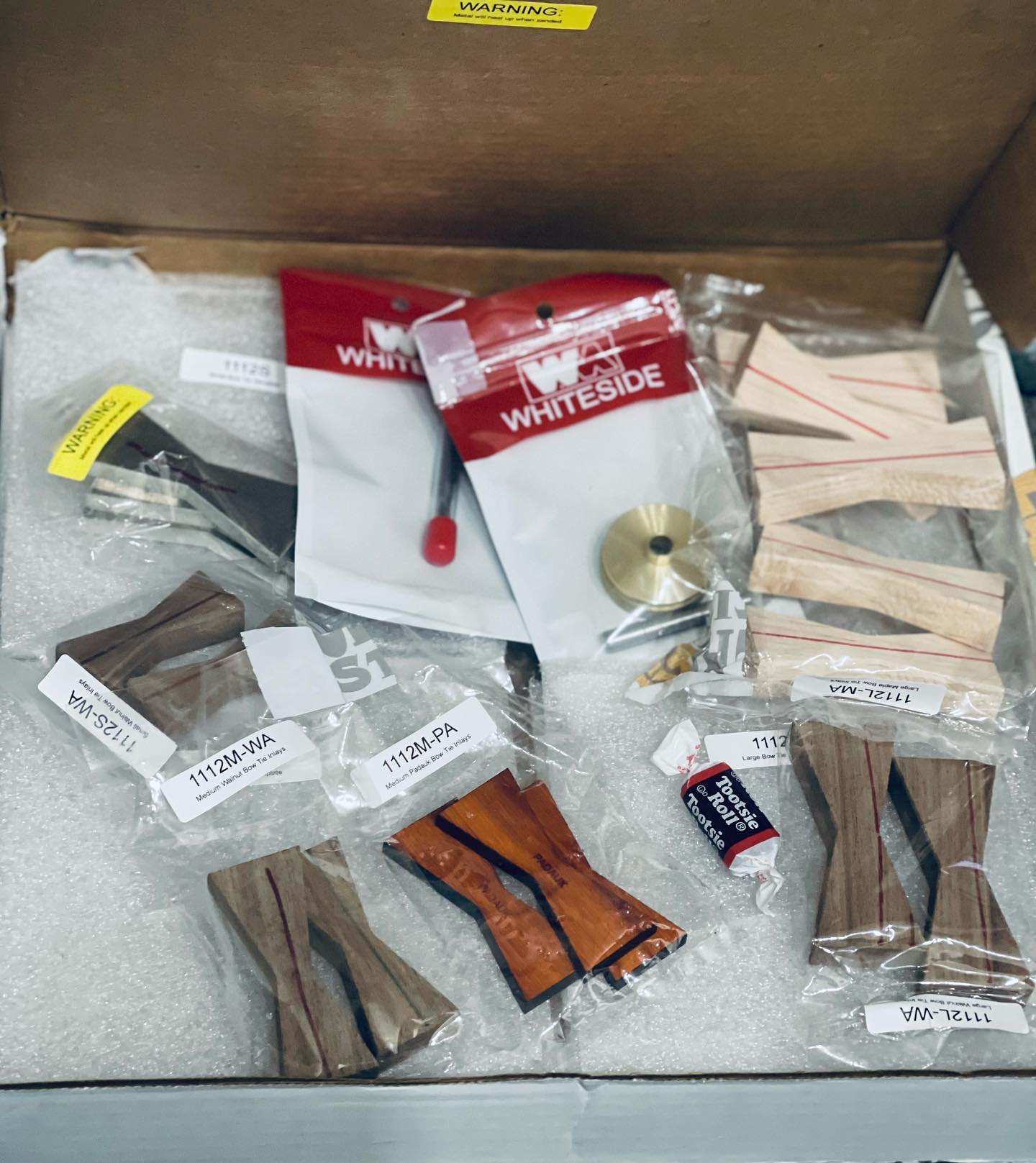 Any other woodworkers have a love-hate relationship with handmade bowties? Going to try out this bow tie kit from @slabstitcher. Tootsie Rolls are also my favorite. 🔥🤤#bowtiesarecool #woodworking #moretimeforkids #liveedge