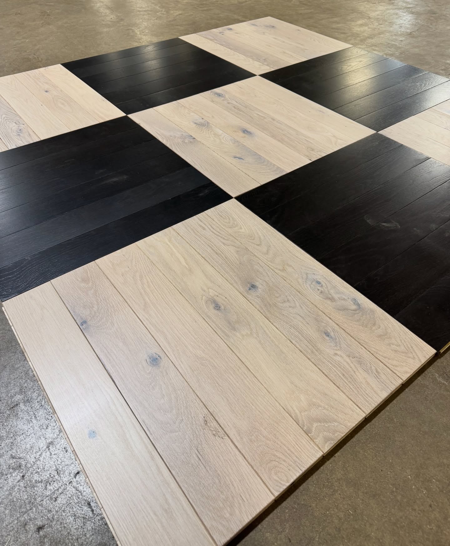 We had a vision for a timeless black and white checkered wood parquet floor, and when we shared it with our hardwood manufacturer, they were all in. Classic, bold, and designed to last for generations. And we’re just getting started… more colors to come. #TimelessDesign #Parquet #CheckeredFloor #GrafCustomHardwood #SimplyQuartered
