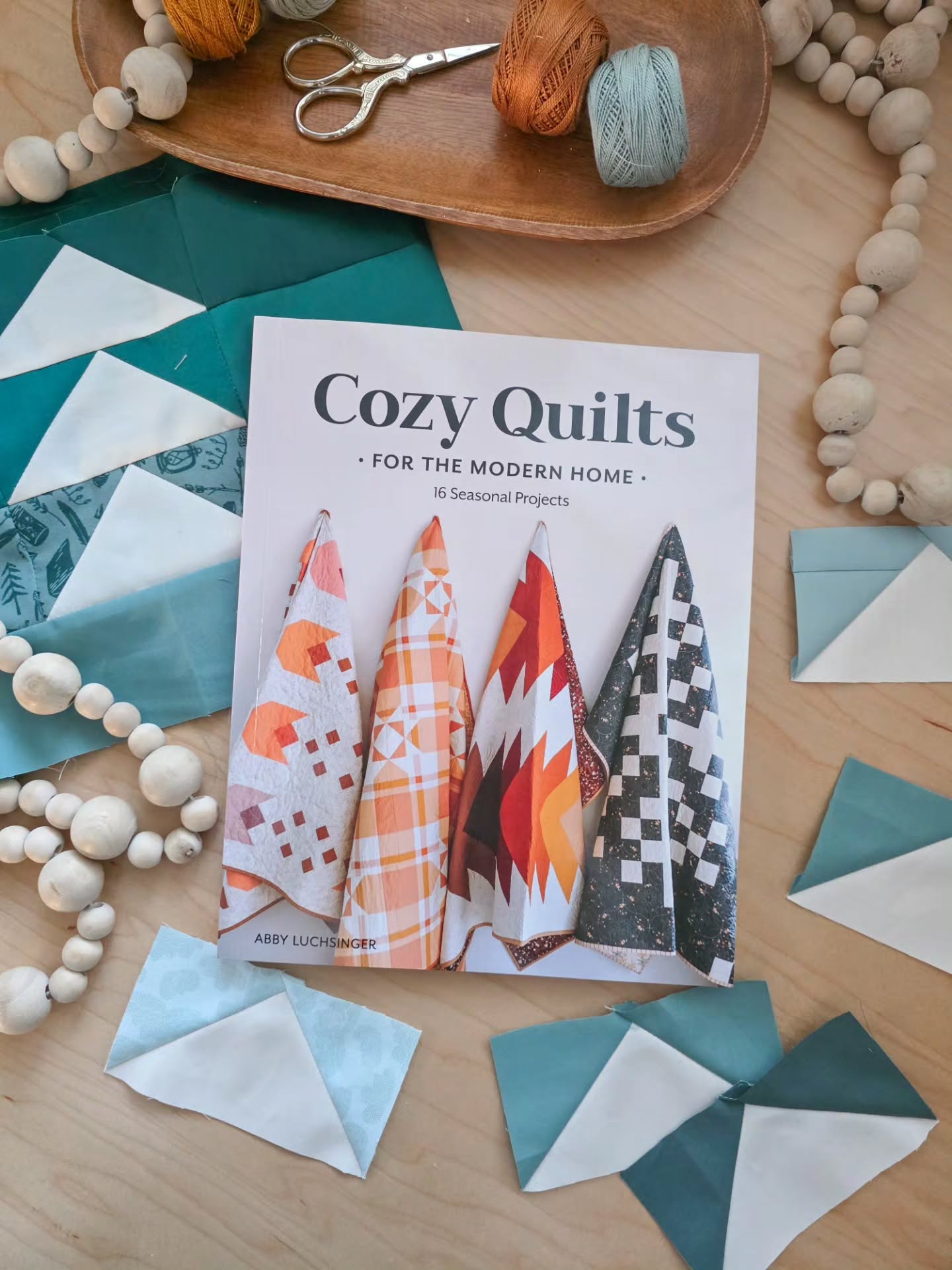 Time to cozy up with a good book!
My friend Abby @abbymaed wrote a new book called Cozy Quilts for the Modern Home and it's sooooooo gooooood!
It's thoughtfully arranged by season with 16 projects from totes to quilts for a full year of quilty inspiration 🤗
I'm making the Woodsy quilt from the winter section of the book, which is personally very on brand for me with the nature vibes and also the perfect quilt for my new baby niece who was born into a very outdoorsy family! I love how Abby used an ombre palette in her Woodsy quilt which served as the inspo for mine. Can't you just picture a stand of evergreens in a quiet winter forest?
Everything is well explained and the diagrams and steps are easy to follow. Pair that with the gorgeous photography throughout the book, and it’s truly inspiring to flip through, even when you’re not actively sewing. So many of the quilts and projects (yes! there are projects, too, not just quilts) are on my to-make list!
More than anything, this book feels like Abby. Creative, intentional, and warm. If you enjoy seasonal sewing or love projects that feel at home in a modern space while still being cozy and inviting, this is one you’ll want to add to your quilty library 😊
You can find Cozy Quilts for the Modern Home linked in @abbymaed Abby's bio in her profile or at major booksellers.
Pattern: Woodsy quilt from the book Cozy Quilts for the Modern Home by @abbymaed
Fabrics: mostly @artgalleryfabrics