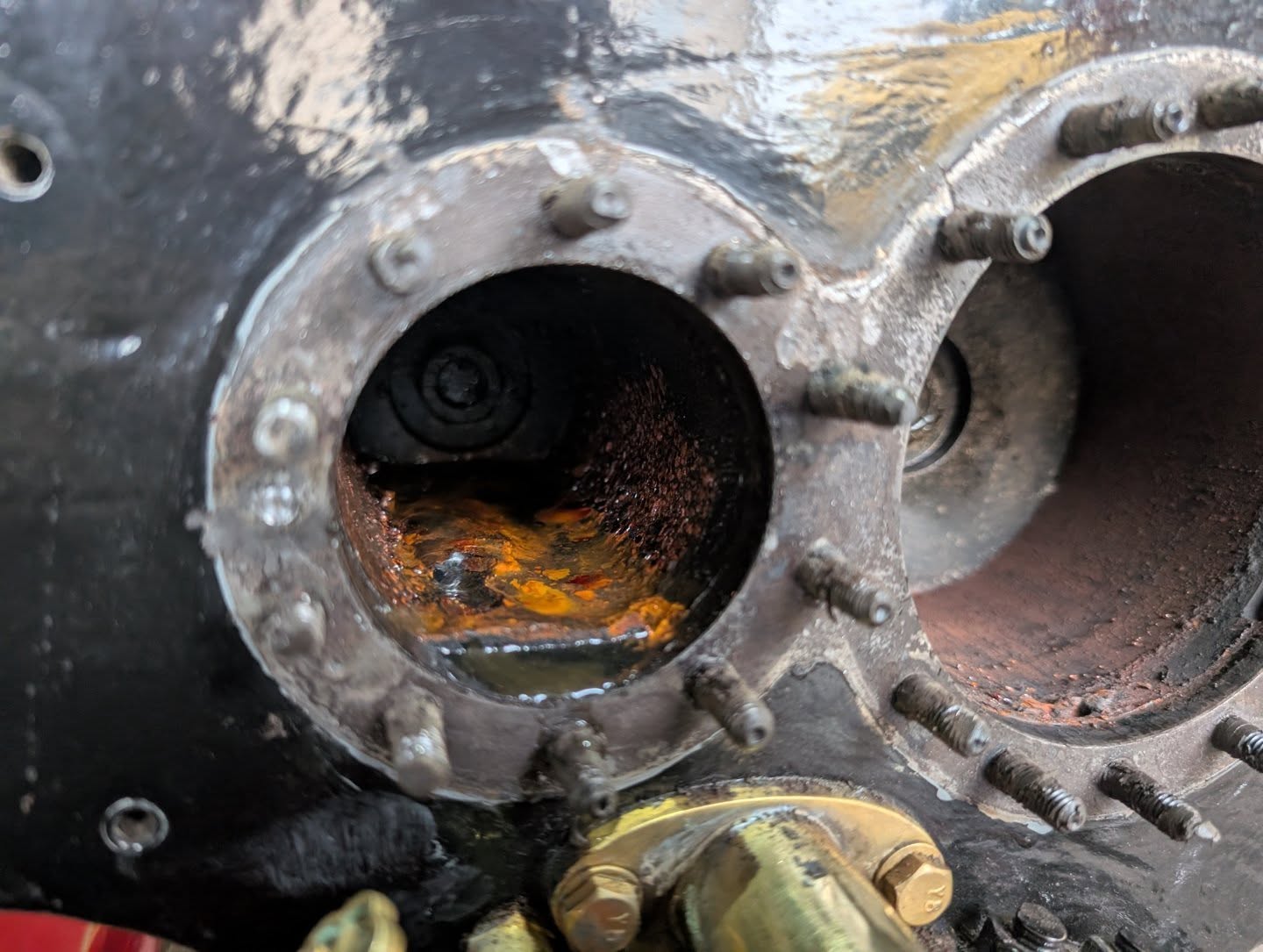 Word of warning to all miniature owners, especially compound engines with no drains on the HP side.
STOP TICKING THE ENGINE OVER UNTIL IT COMPLETELY RUNS OUT OF STEAM!!
There seems to be a habit of people running engines at the end of the day until the pressure completely drops, all this does is put very wet steam and condensation into your cylinder block. Not an issue if you are steaming up the next day but can have bad consequences if then left such as over winter. This engine was in a heated workshop with boiler, tanks etc completely drained down and dry.
We always recommend when putting engines away for any period to have the engine at operating pressure, pump a load of oil in on the mechanical lubricator, run the engine for 20 (ISH) seconds so that heavy dose of oil can get into the cylinder block. Shut the regulator then leave it shut. If required you can fill up with water via the injector.