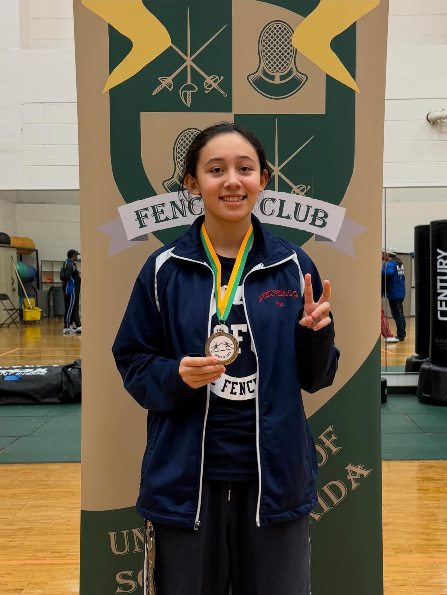 Poppy won 7th place and earned a medal at the USF Green and Gold RYC Y12 Women’s Épée held in Tampa, Florida.
Huge, huge congratulations!!!
“OFC POPPY HAPPY”