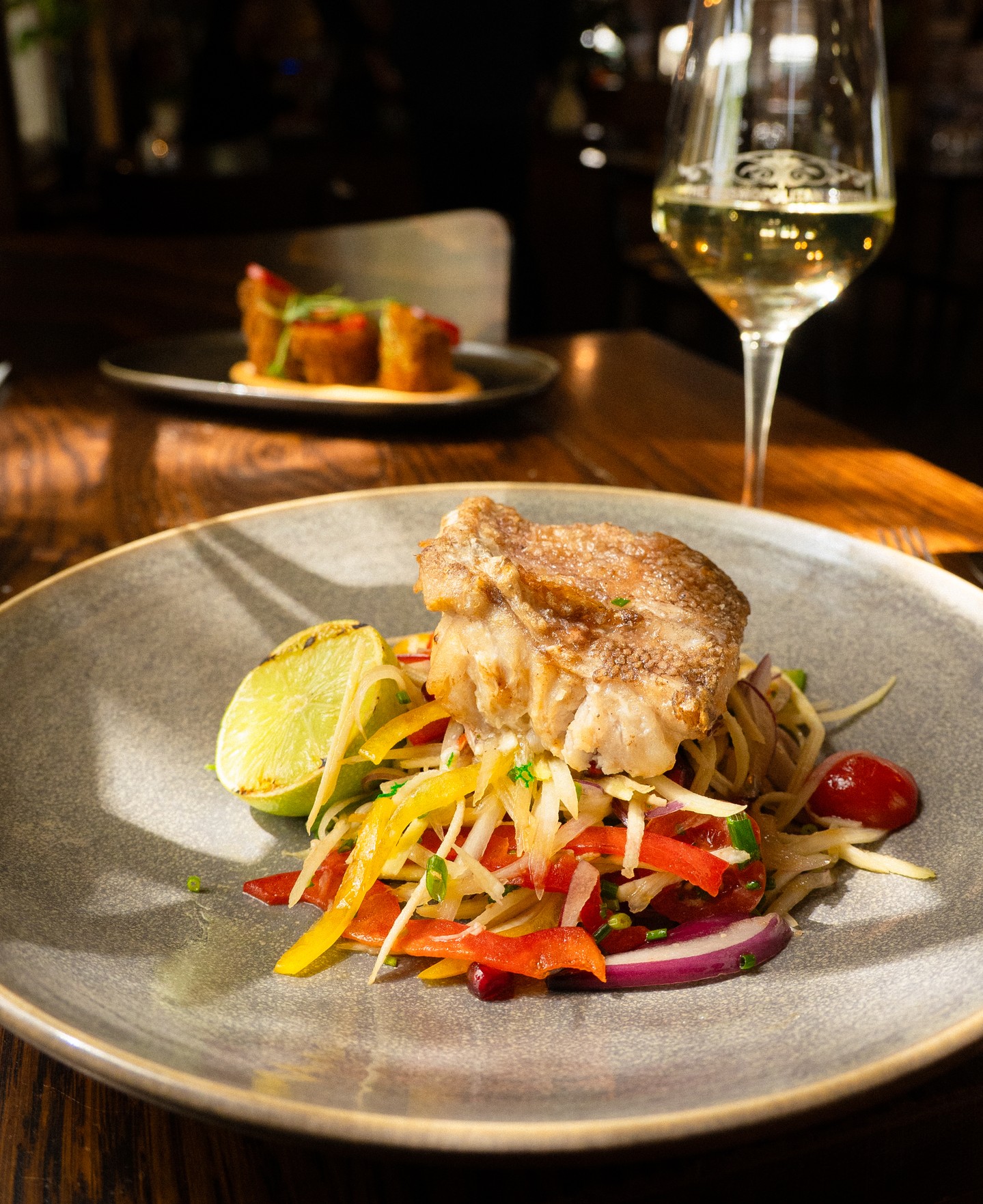 A popular summer dish for good reason - Grilled rockling, green mango and papaya salad, capsicum, cherry tomatoes, kaffir lime and coconut sauce. Fresh, vibrant, delicious!
.
.
.
.
#trentham #hepburnshire #daylesfordmacedonlife #macedonranges #cosmotrentham #thecosmopolitanhotel #onehourout #onehouroutofmelbourne #melbournefoodie #daylesfordmacedonlife #macedonrangeswine #countryvictoria #regionalvictoria #visitmacedonranges #visitvictoria