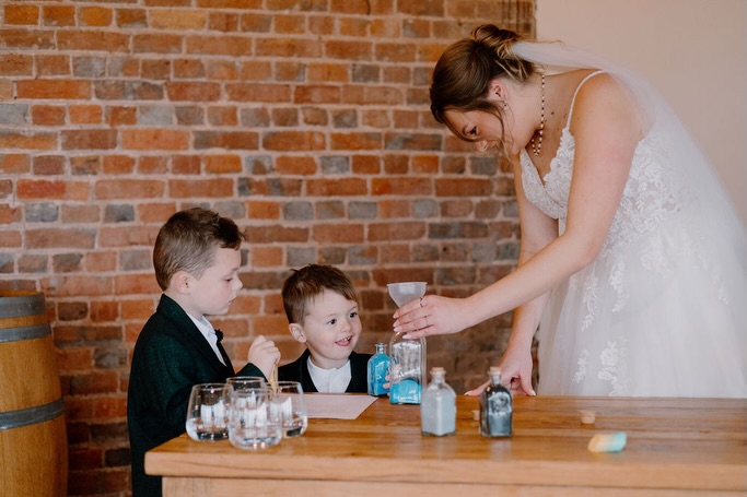 ✨ What is a Sand Ceremony? ✨ It is a beautiful symbolic moment where each of you can pour sand into a shared vessel.
It could be sand from your beaches that mean a lot to you - where you had your first date, your favourite beach to go on a Sunday stroll, where you got engaged.... or you can use coloured sand which represents what you want from your marriage:
🤍 White sand: purity, honesty and a fresh beginning
💙 Blue sand: loyalty, stability and calm
❤️ Red sand: passion, love and courage
💛 Yellow sand: joy, warmth and positivity
💚 Green sand: growth, renewal and nurture
As your sands blend together, each grain symbolises your lives intertwining and becoming inseparable.
It is a great moment to involve others, especially children. You could even get them to stir the sand every year on your anniversary so they can be a part of it. Georgia and Warren loved involving their two young sons who had lots of fun pouring their sand in ☺️ It was a lovely moment for their family which we really enjoyed watching.
Photos @mimosa_photography
Venue @brickhousevineyard
#sandceremony #elopement #weddingcelebrantdevon