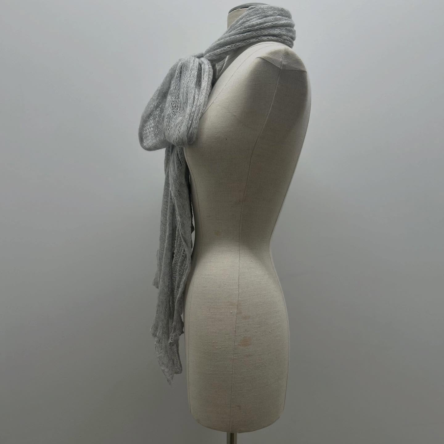 Made on a Singer machine knitter .