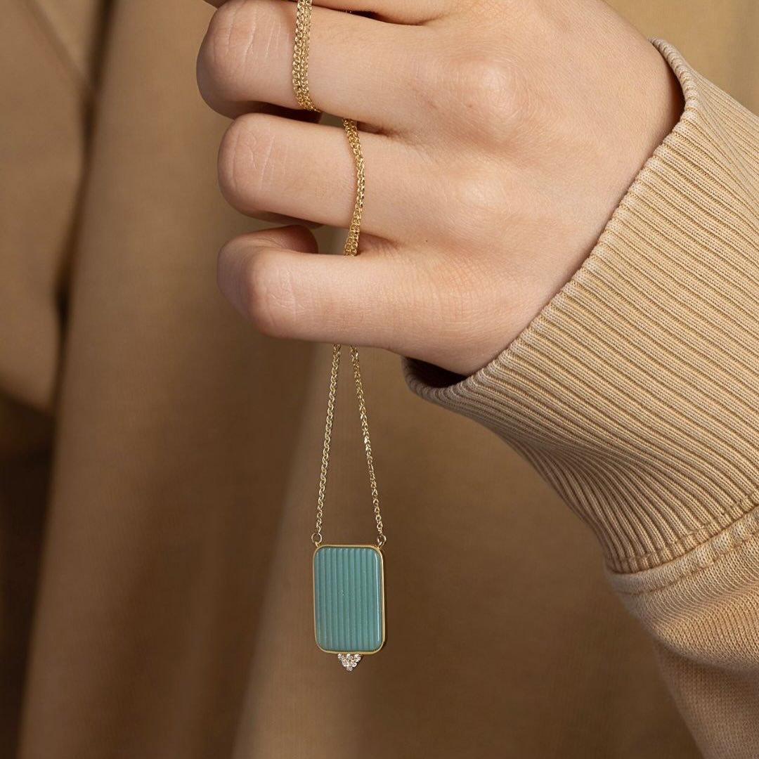 Green Kion pendant, crafted with a green agate in 14k yellow gold. #fotinipsarouli #fotinipsaroulijewellery #handmadejewelry #finejewelry #pendant