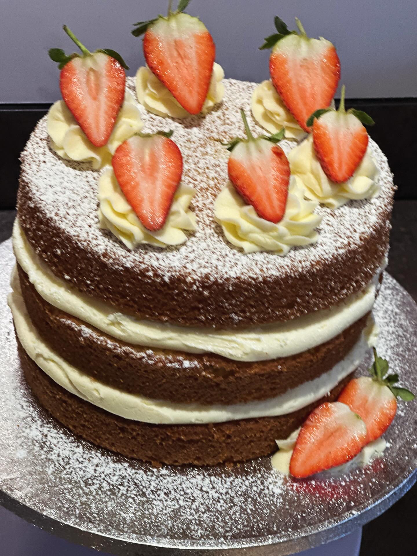 Beautiful strawberry and vanilla sponge cake for a birthday treat #birthdaycake #sayitwithcake #vanillasponge #happybirthday #cakewithstrawberries