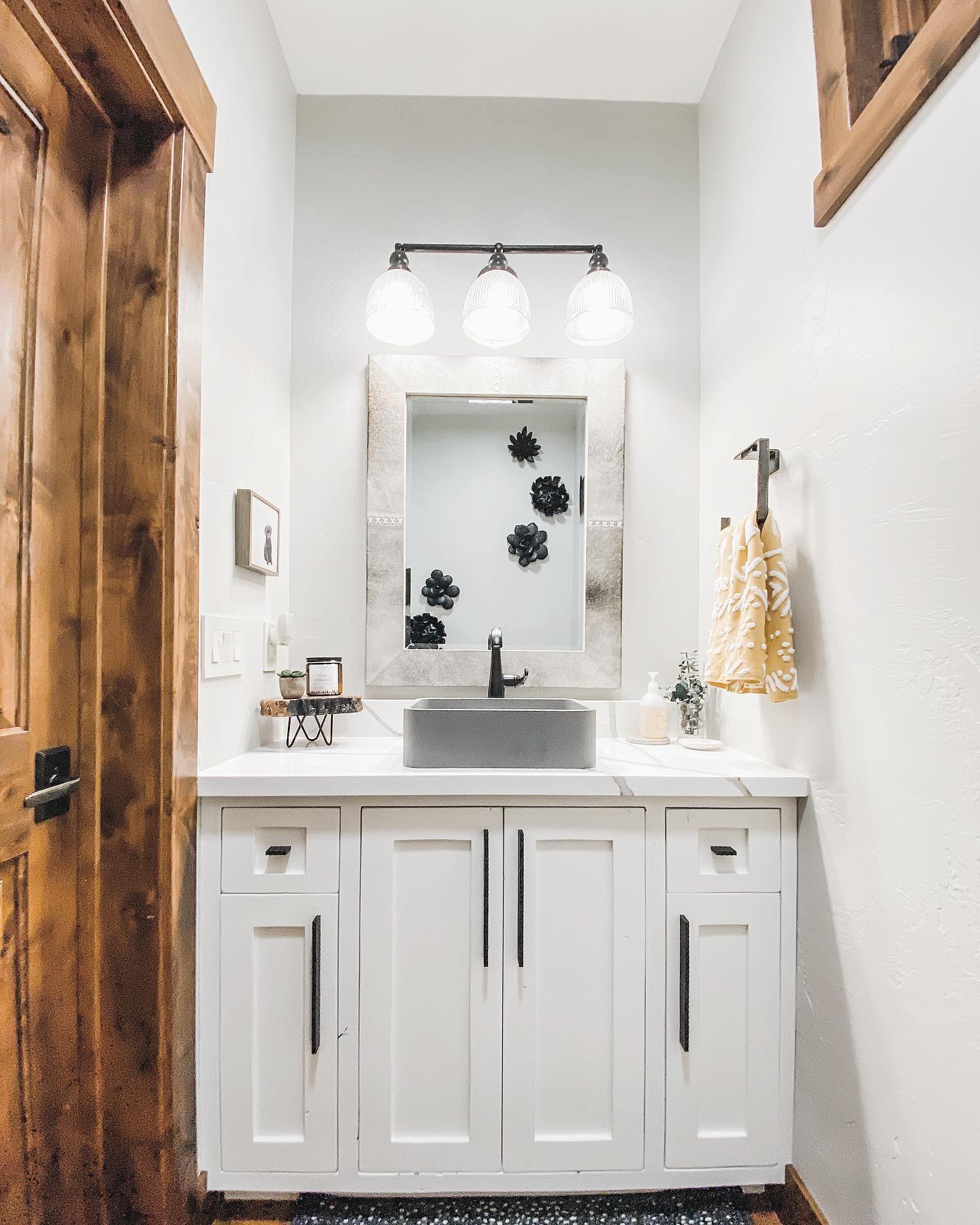 Heaven is in the details.
This powder room was curated from intentional, and since we’re in the throne room dare I say intimate, time spent getting to know this amazing family!
Every element is a piece of what they love. There is plenty of grit, and touches of grace for a family that knows how to work their booties off and also enjoy the simple pleasures of life!
But most of all…must love dogs!